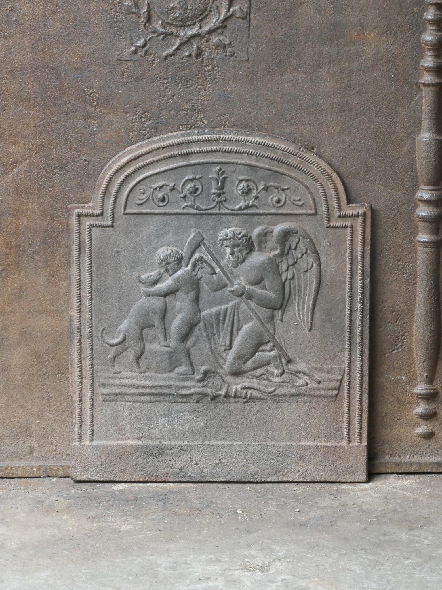 18th-19th Century Neoclassical period French fire back with the time. The time, an old man with a scythe, symbol of the ephemeral character of life.

The fireback is made of cast iron and has a natural brown patina. Upon request it can be made black