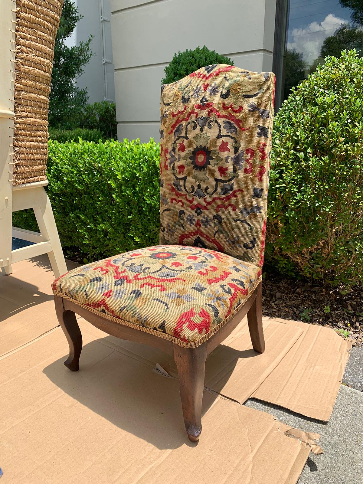18th-19th century French walnut and needlepoint child's chair
Measures: 16.75