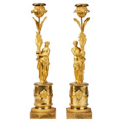Siglo XVIII - XIX Pareja francesa de antiguos candelabros imperio de bronce dorado