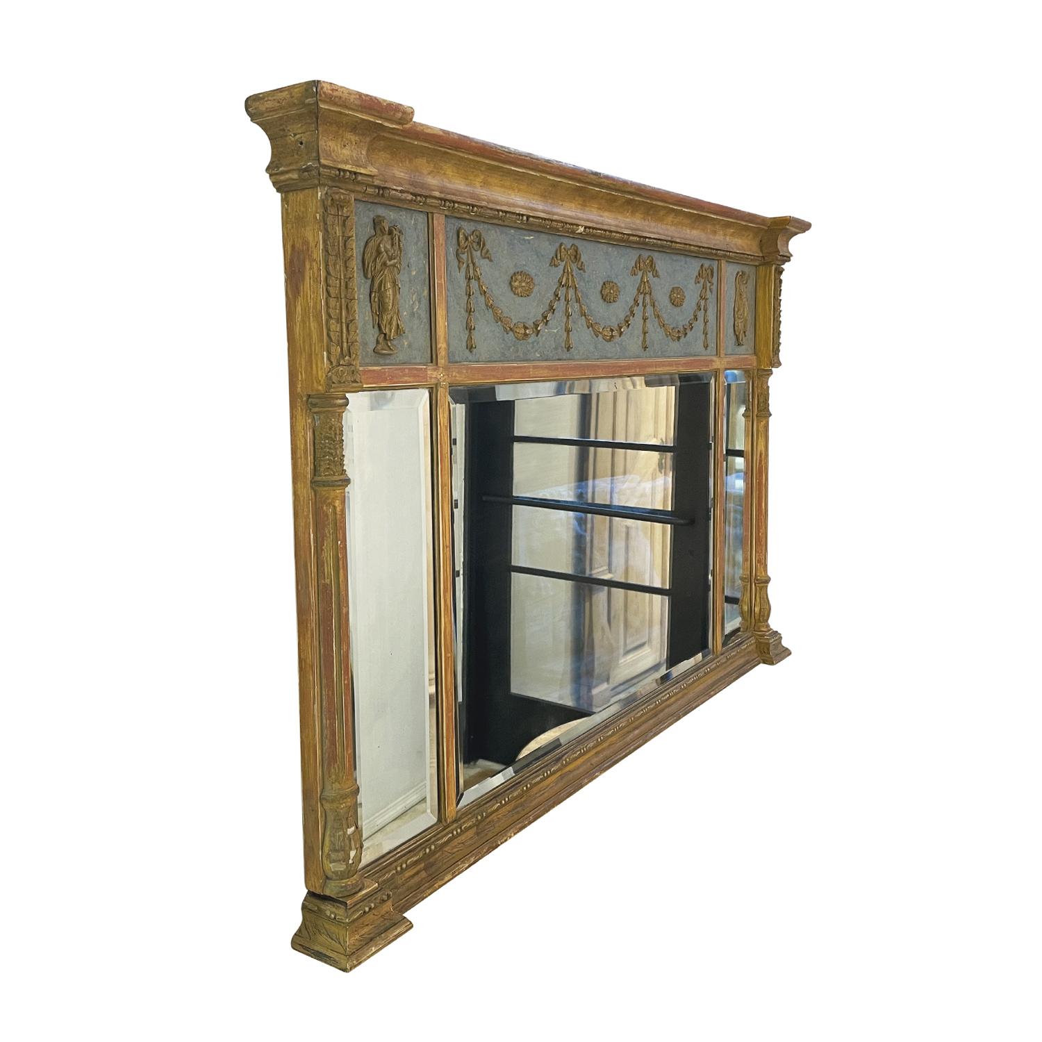 A gold, antique Swedish Gustavian rectangular wall mirror with its original mirror glass and blue color paint, made of handcrafted gilded Pinewood, in good condition. The wall decor piece was designed and produced by an unknown artist from