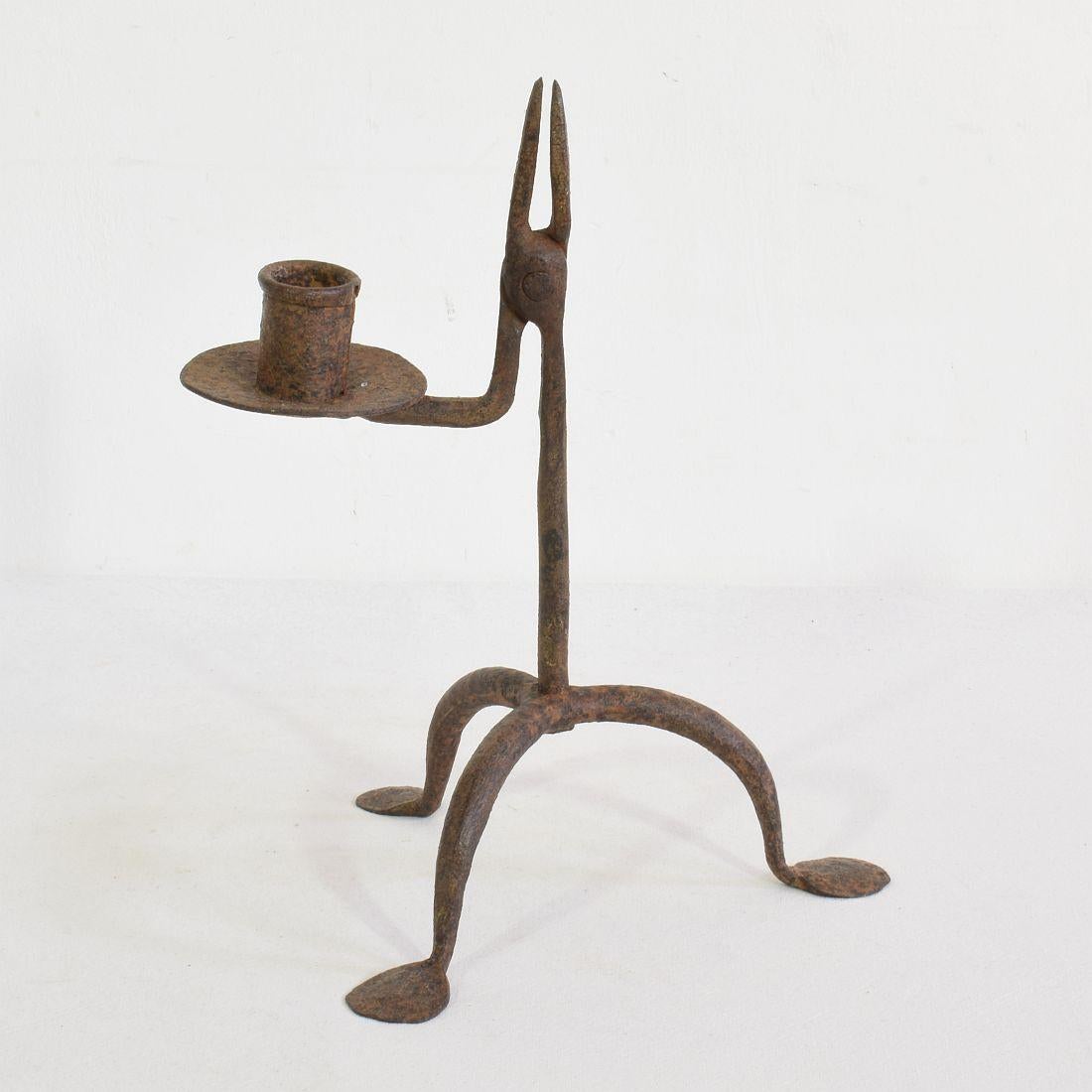 Beautiful hand forged iron candleholder, Southern France, Spain, 18th-19th century. Weathered.
