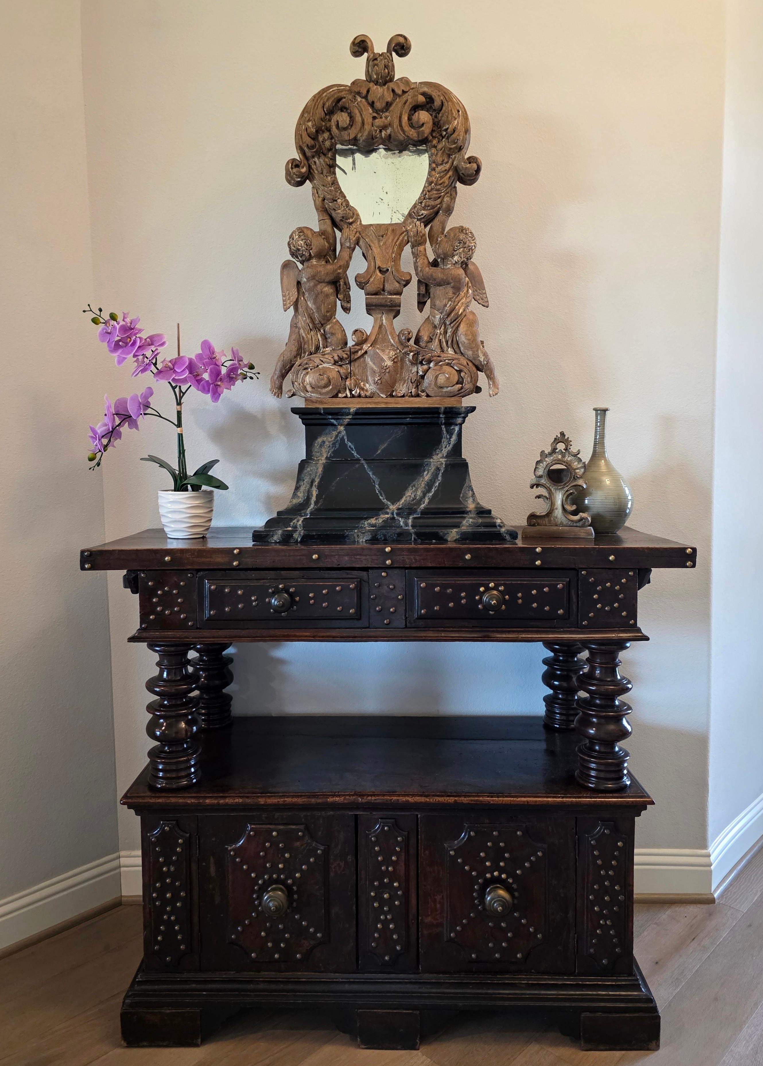 A rare and most impressive antique Italian Baroque sculptural carved altar reliquary relic shrine.  

18th/19th century, Italy, almost certainly from a castle church/chapel in Northern Italy, the relic removed and replaced with a beveled mirror