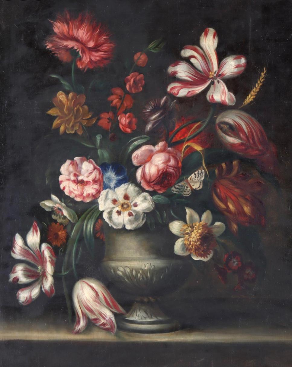 18/19th Century Floral Still Life, Oil On Canvas, Painting in an 18th century giltwood Frame. Painting has a colorful profusion of flowers in a gray-silver colored urn. Flowers are in rich colors and styles including pink, white, red, blue on a