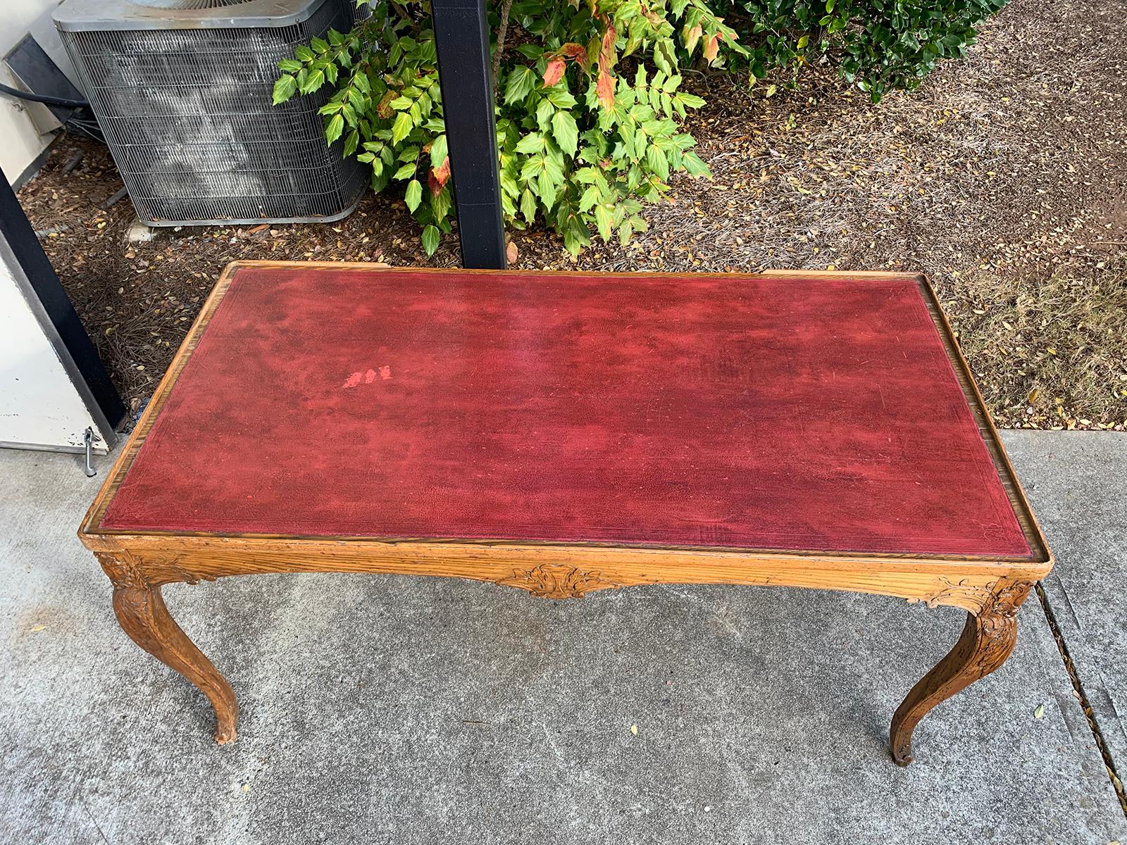18th-19th century French Louis XV style carved tric-trac table with red leather top.