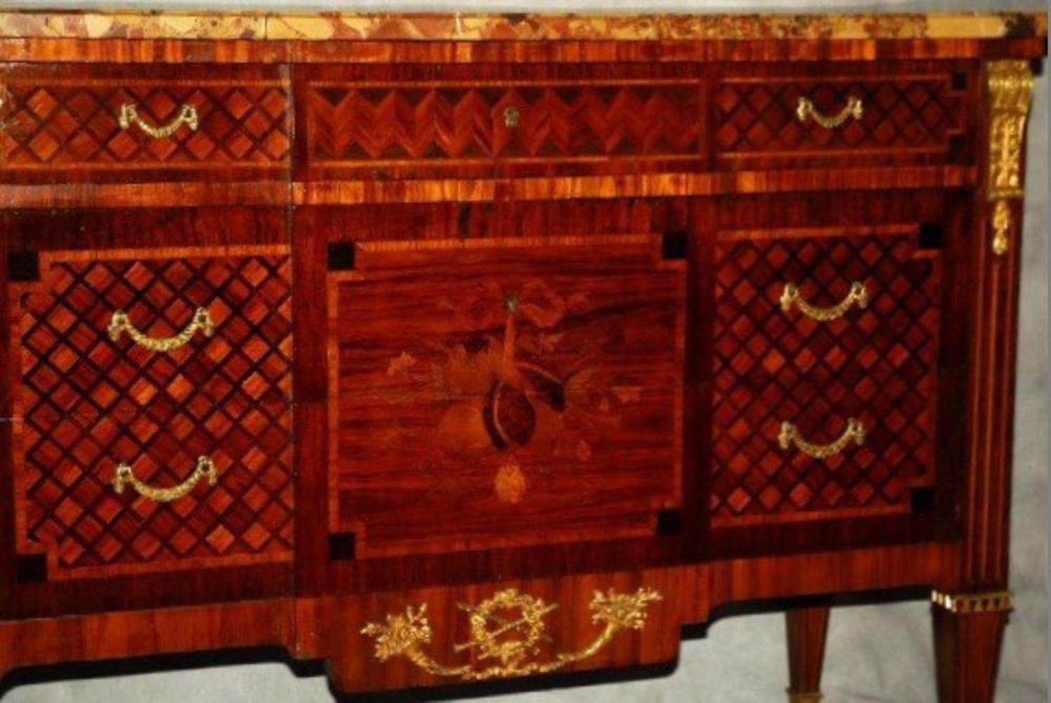 18th-19th century Louis XVI marquetry and parquetry three-drawer marble-top commode.