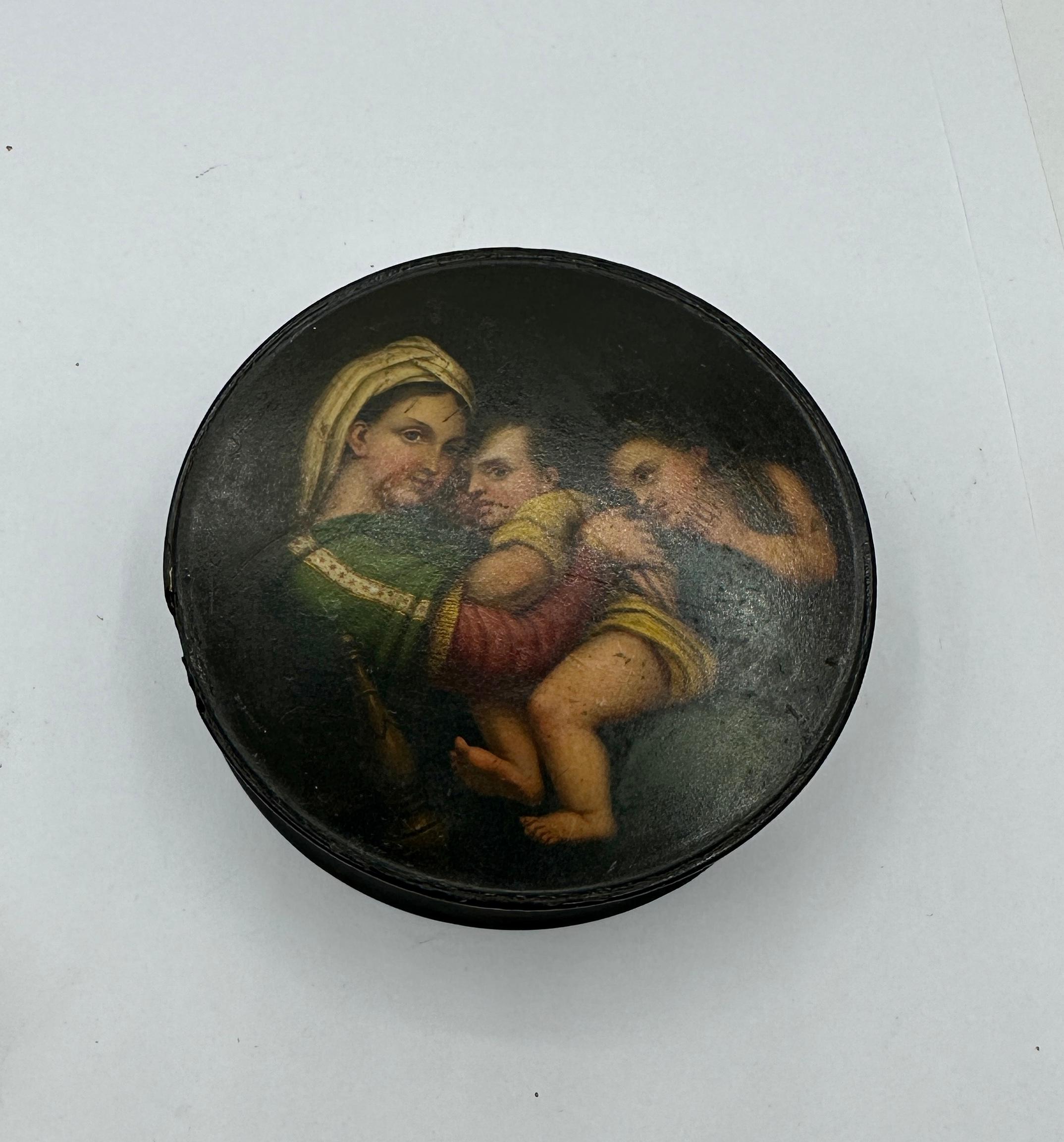 This is a wonderful and rare 18th to 19th Century Antique Box with an extraordinary hand painted portrait miniature of the Madonna and Child with an Angel.  The portrait miniature is of the highest quality.  The faces of the Madonna and Child are