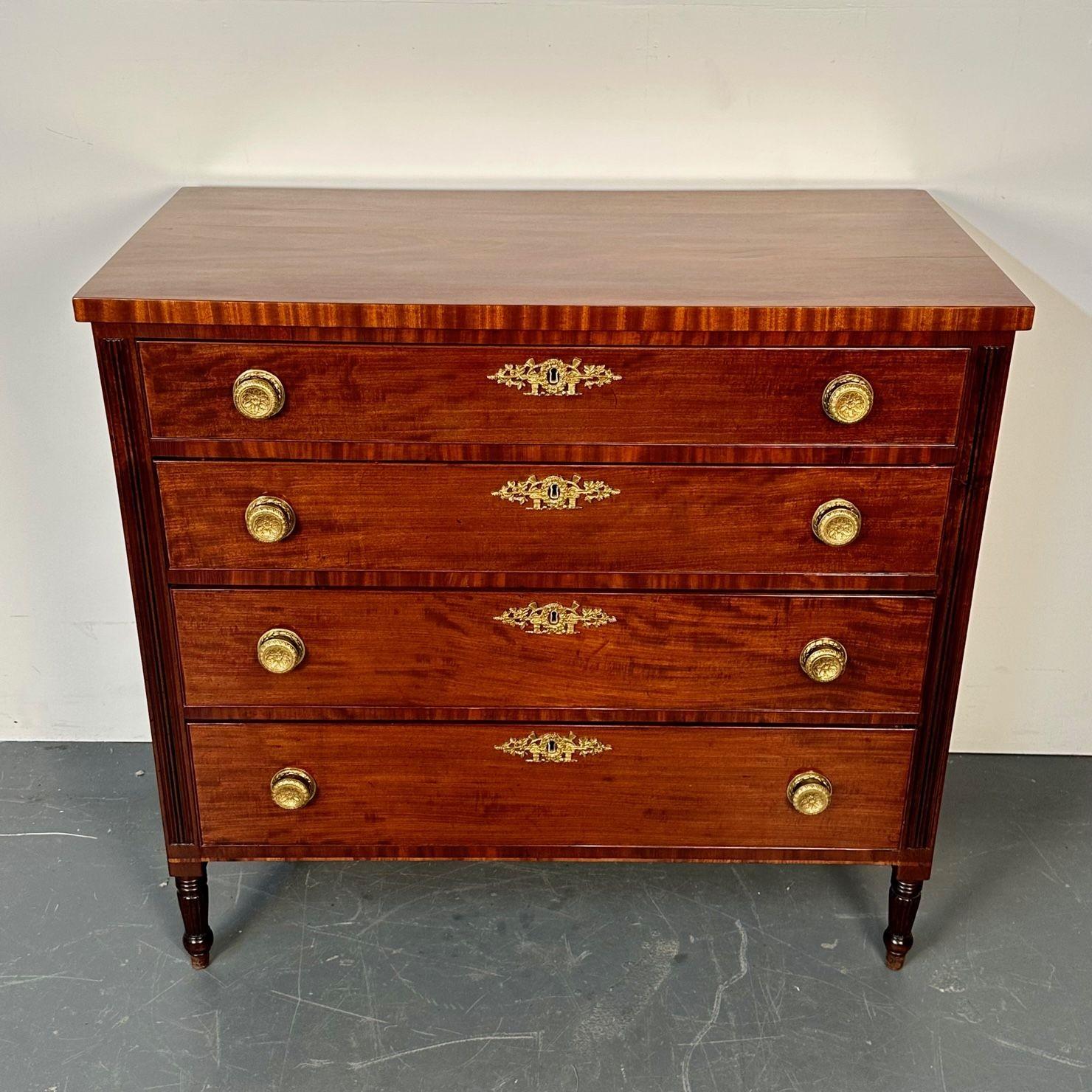 Polished 18th/19th Century Mahogany Chest, Dresser or Commode, Bronze Accents
 
Wonderfully polished having spindle legs leading to a group of four graduating drawers all with dore' bronze pulls and key hold mounts. The interior having finely