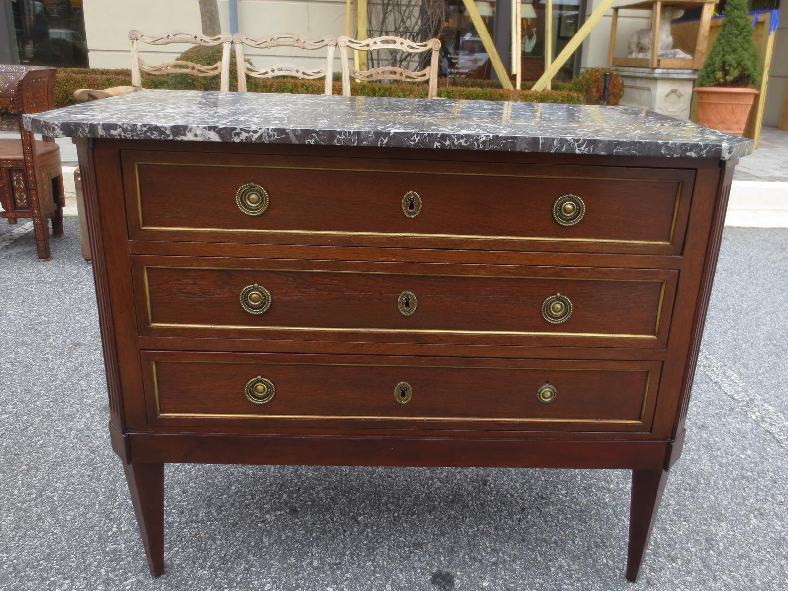 18th-19th century marble-top Louis XVI style mahogany chest.
