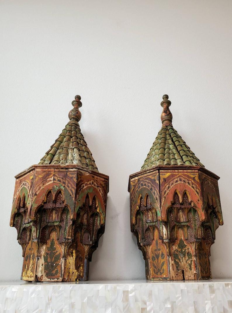 A magnificent pair of Moroccan mosque architectural ornaments. Exquisitely hand-crafted in the 18th / 19th century, the rare, one of a kind religious folk art works, richly hand carved and painted, intricately detailed in vaulted mocárabe technique