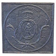 Plaque de cheminée d'époque néoclassique du 18e/19e siècle « Weeping Cupid »