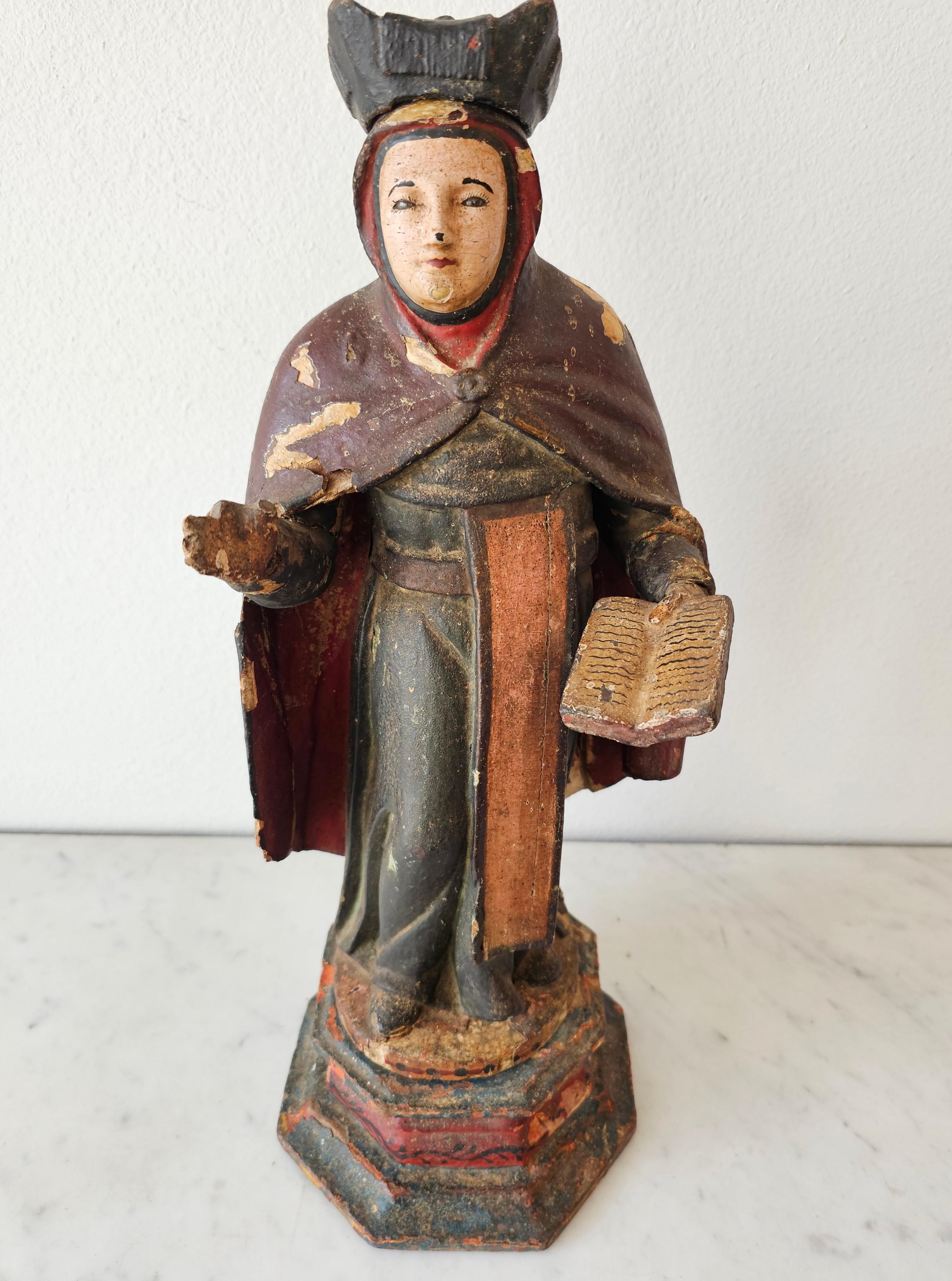 A most impressive antique Spanish Colonial hand carved polychromed wood Santo Catholic church altar figure. circa 1800

Hand-crafted in the late 18th / early 19th century, exceptionally executed intricate detailing, the large scale antique religious
