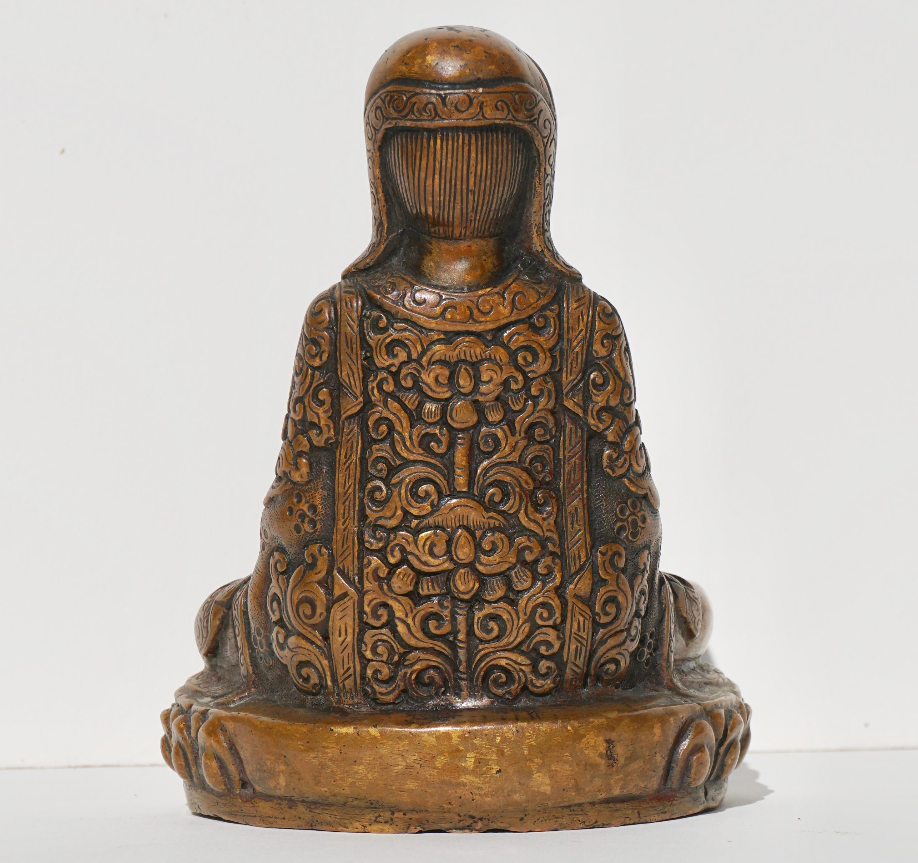 18th- 19th Century Tibetan Copper Alloy Bronze Lama Buddha with Silver Inlay In Good Condition In Dallas, TX