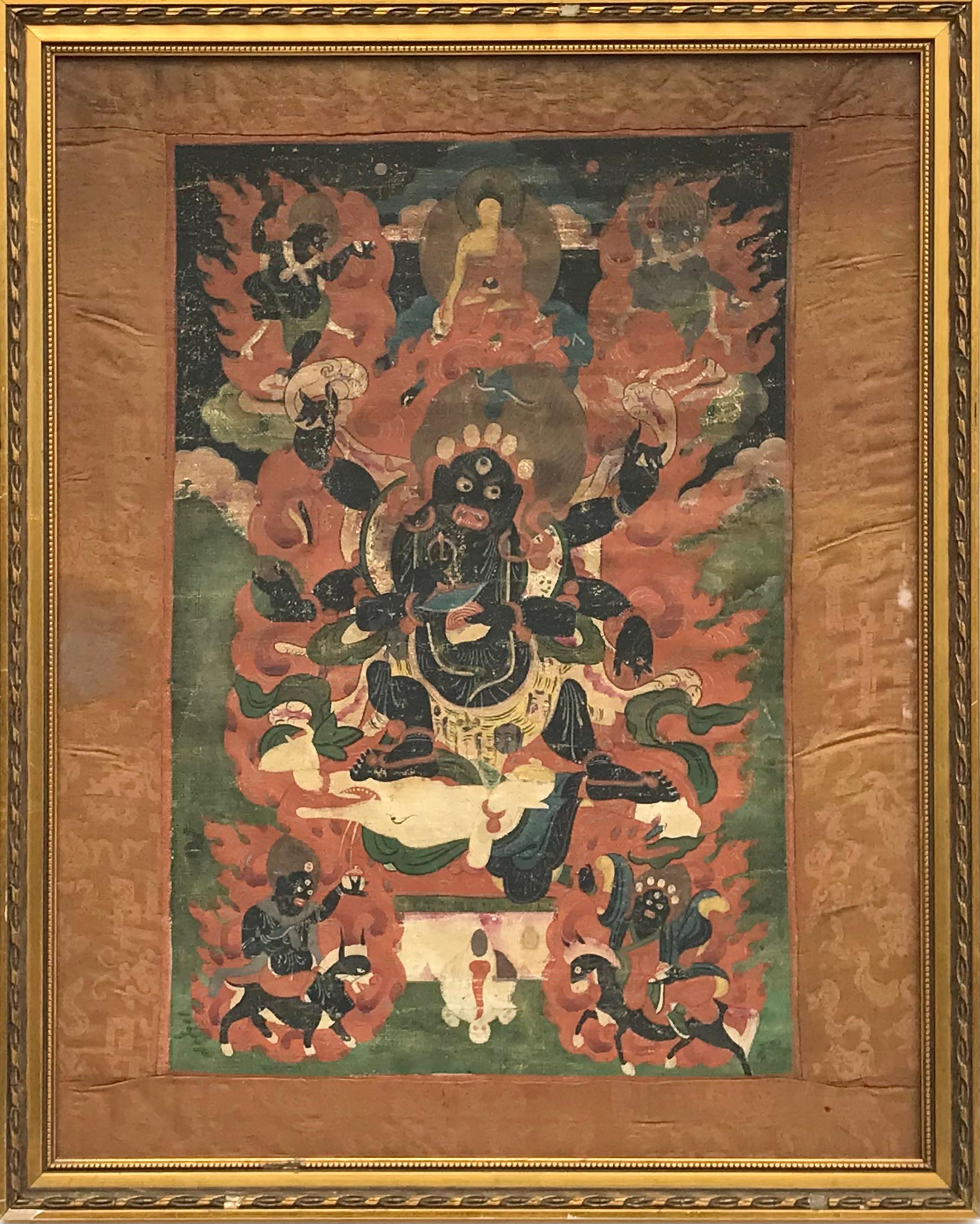 Tibetan Buddhist thangka from the late 18th early 19th century.
Distemper on cloth (either silk or cotton)
 
Depicting a Buddhist deity with multi arms and Buddhist religious relics in hand standing on either a naked human body or animal with flames