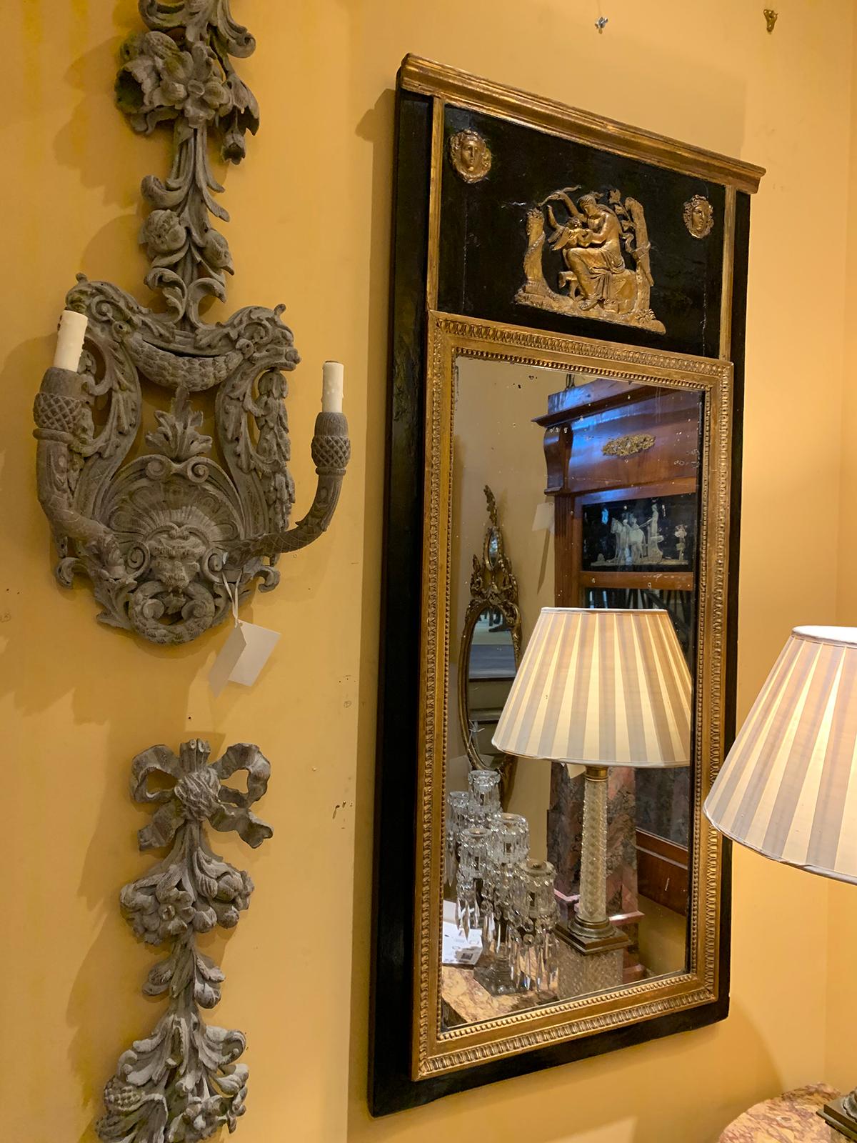 18th-19th century French gilded and black trumeau mirror.