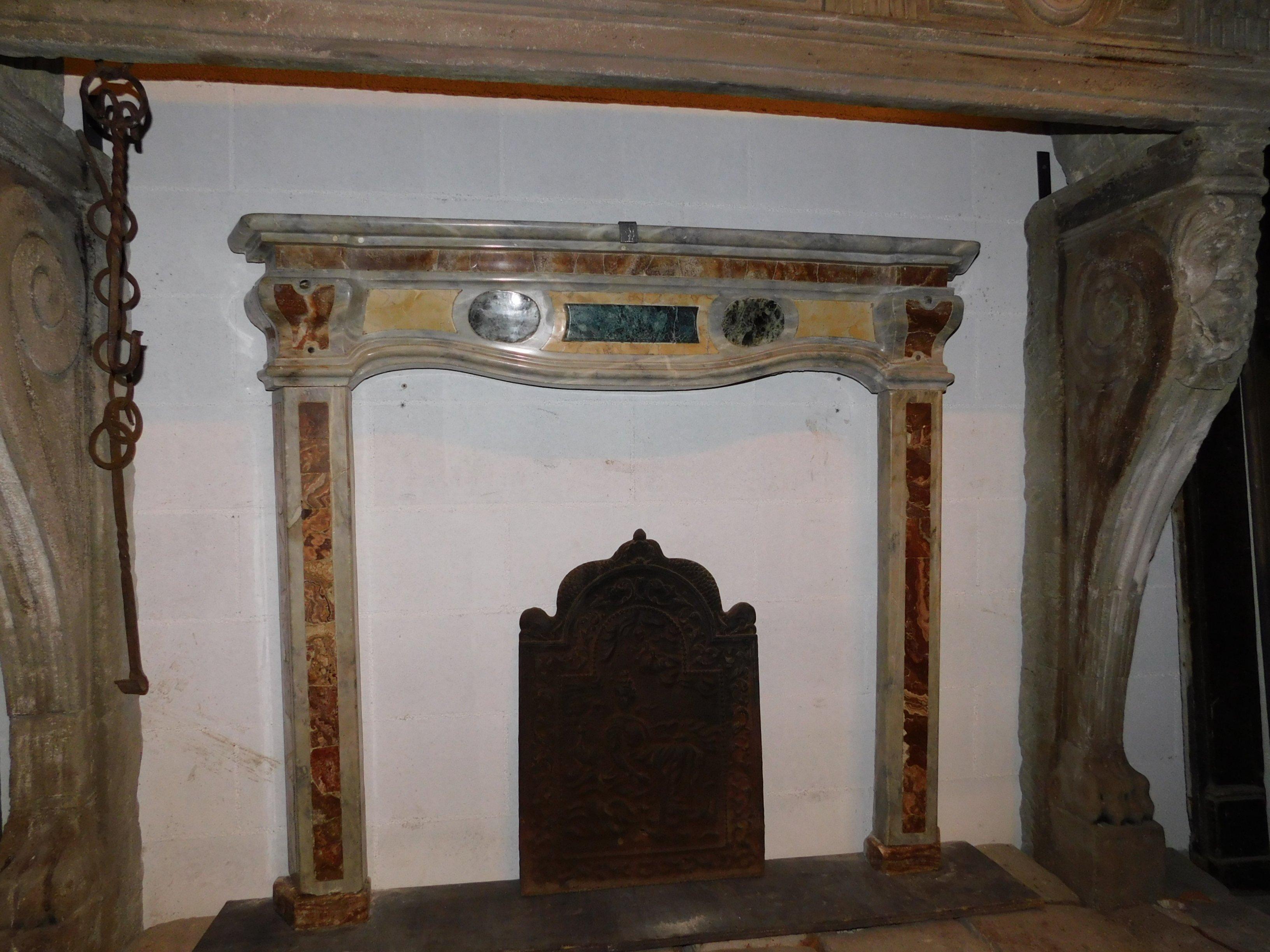 Antique Italian fireplace in Bardiglio gray marble, inlaid with various marbles, France red, Verona yellow and Alps green, first half of the eighteenth century, from northern of Italy, measure floor width. cm 145 x 20 prof. 123 H, 12 cm thick
