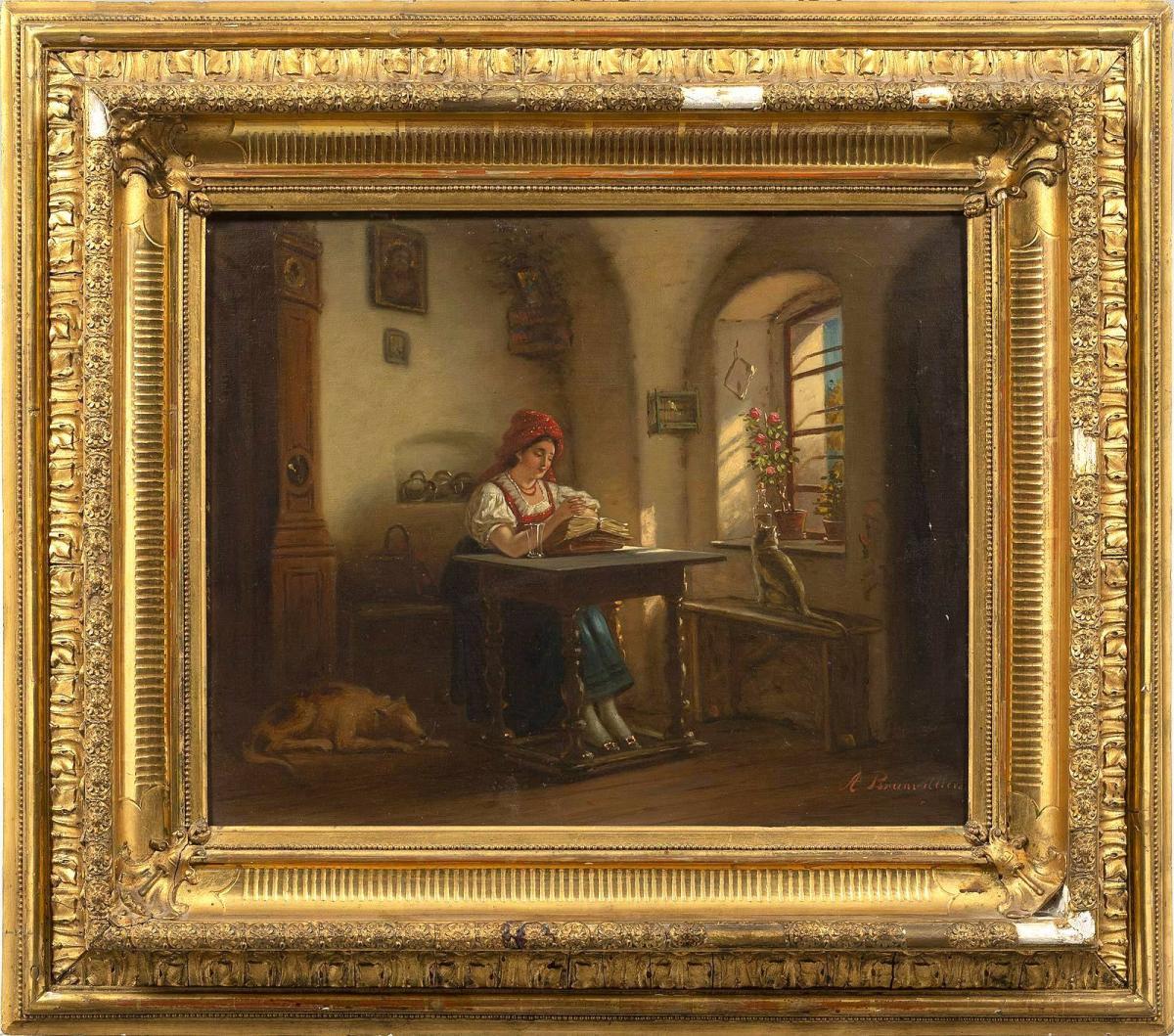 Interesting old painting representing an interior scene animated by a young woman sitting and reading a book. The room is radiated by a warm and grazing light that defines the volume of objects. This is an oil on canvas from the mid-19th century