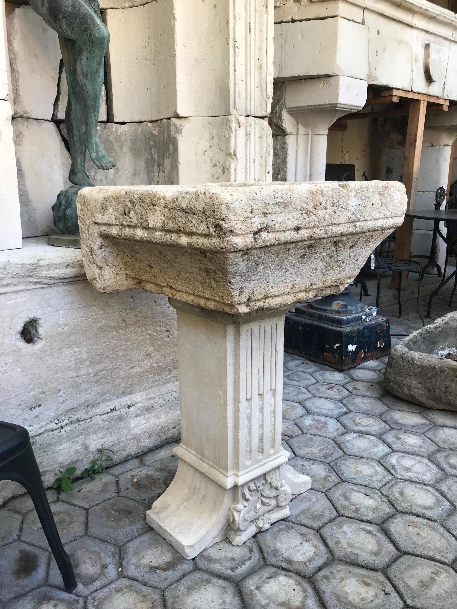 A beautiful carved stone birdbath made of two elements. An 18th century carved limestone Vasque from a monastery in the South West of France, sitting on a store carved pedestal base with intricate details. We can sell the basin without the base.