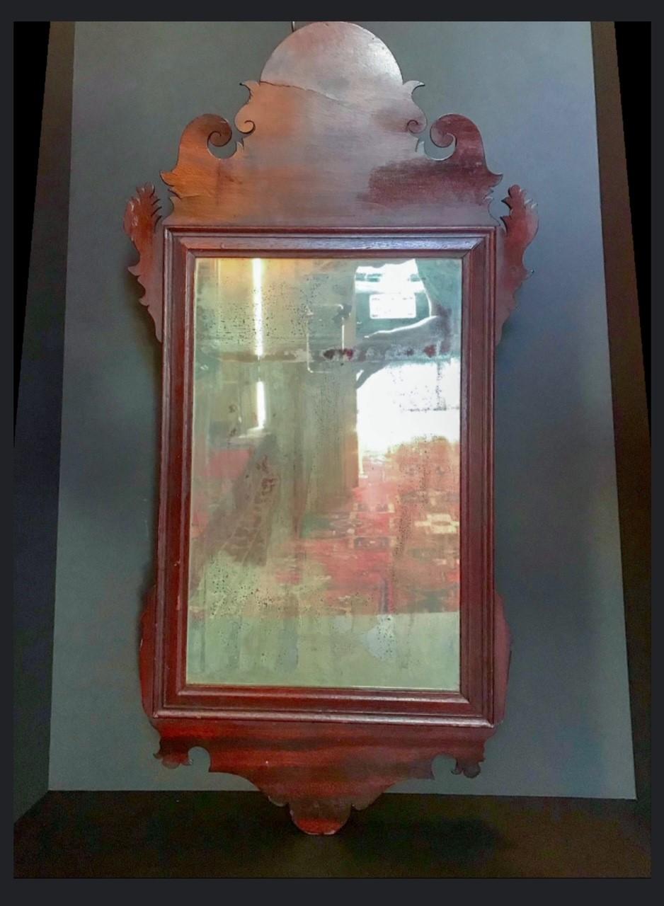 18th C. Chippendale Mahogany Mirror, American, English Style Wall Mirror. Original Glass
Gorgeous antique solid Mahogany American Chippendale mirror circa 1770 with scrolled and feathered details. This mirror has the original back and the original