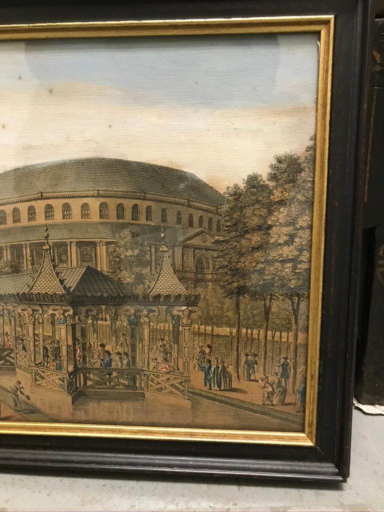 A view of the floating Chinese House at Ranelagh Gardens with a masquerade, the Rotunda in the background, after Antonio Canaletto (1697 - 1768). Engraved by  by Thomas Bowles, 1754.

Hand colored engraving, in an ebonized and giltwood frame.
18