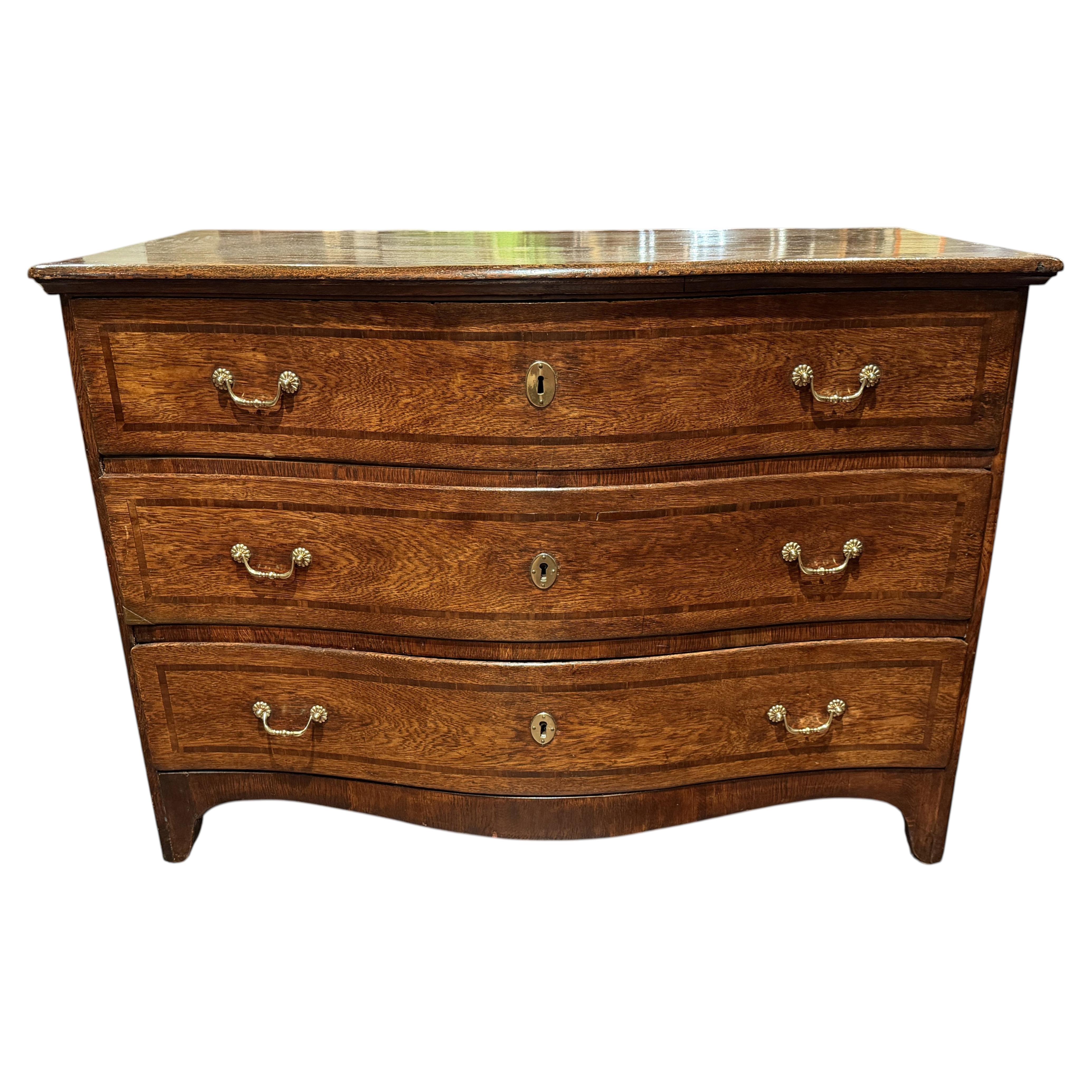 18th c Continental Three Drawer Serpentine Oak Commode with Iron Handles For Sale