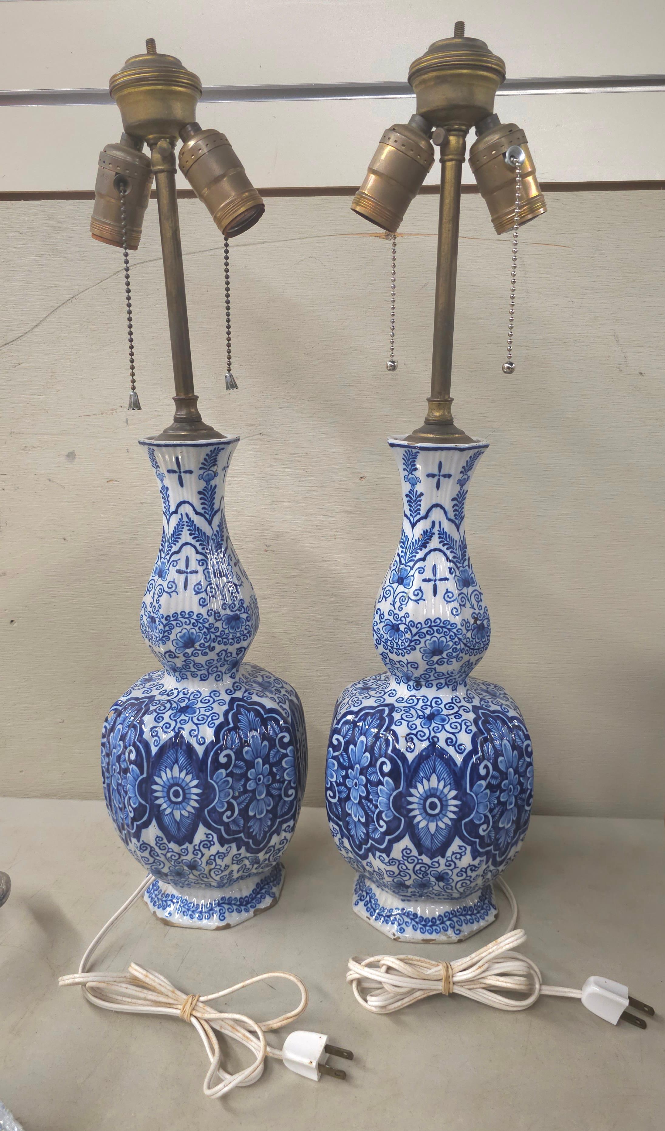 Paint 18th C. Royal Delft Blue and White Lamp Mounted Vases, Signed Van Duijn Pair For Sale