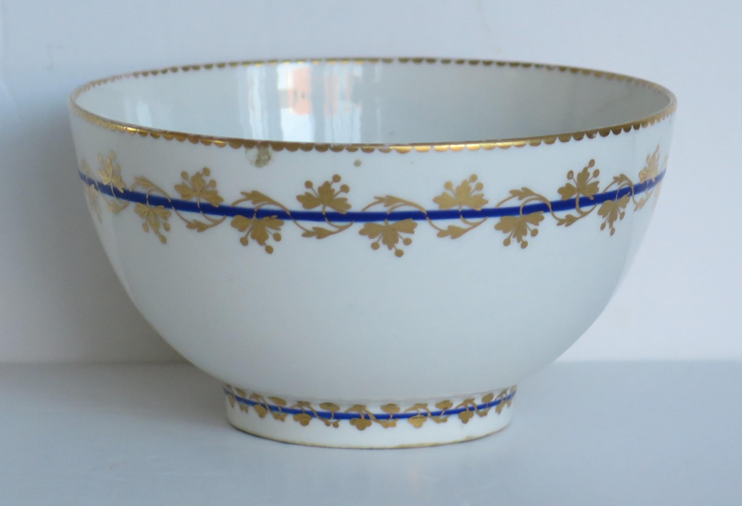 This is a fine quality Derby porcelain bowl in pattern number 110, fully marked with puce crown & battons and dating to 11790, George 111rd period.

It is beautifully decorated in Derby's Pattern 110, with a gilt dentil rim and borders top and