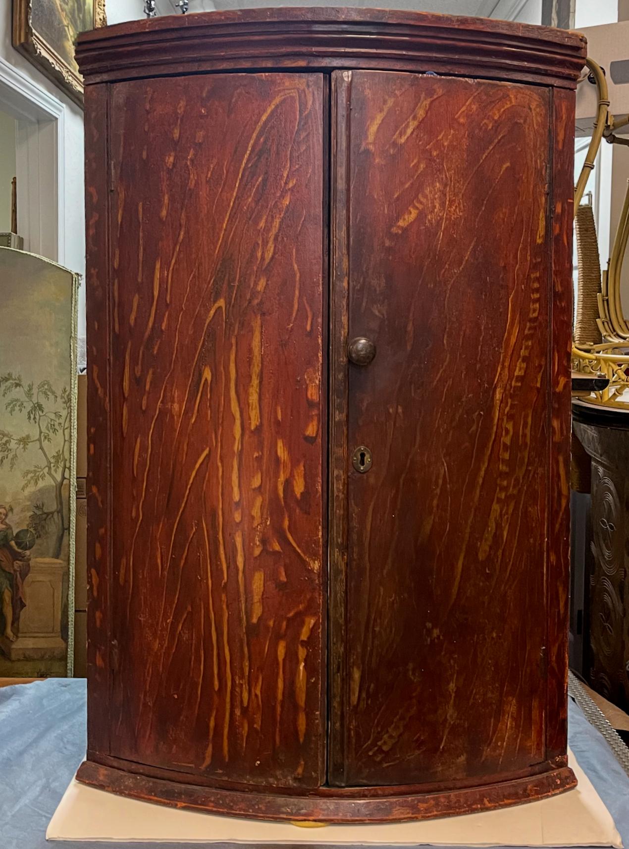 18th Century 18th-C. Early American Primitive Grain Faux Bois Painted Corner Wall Cabinet For Sale