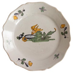 Plato francés del siglo XVIII Nevers Birdbath Faïence policromado
