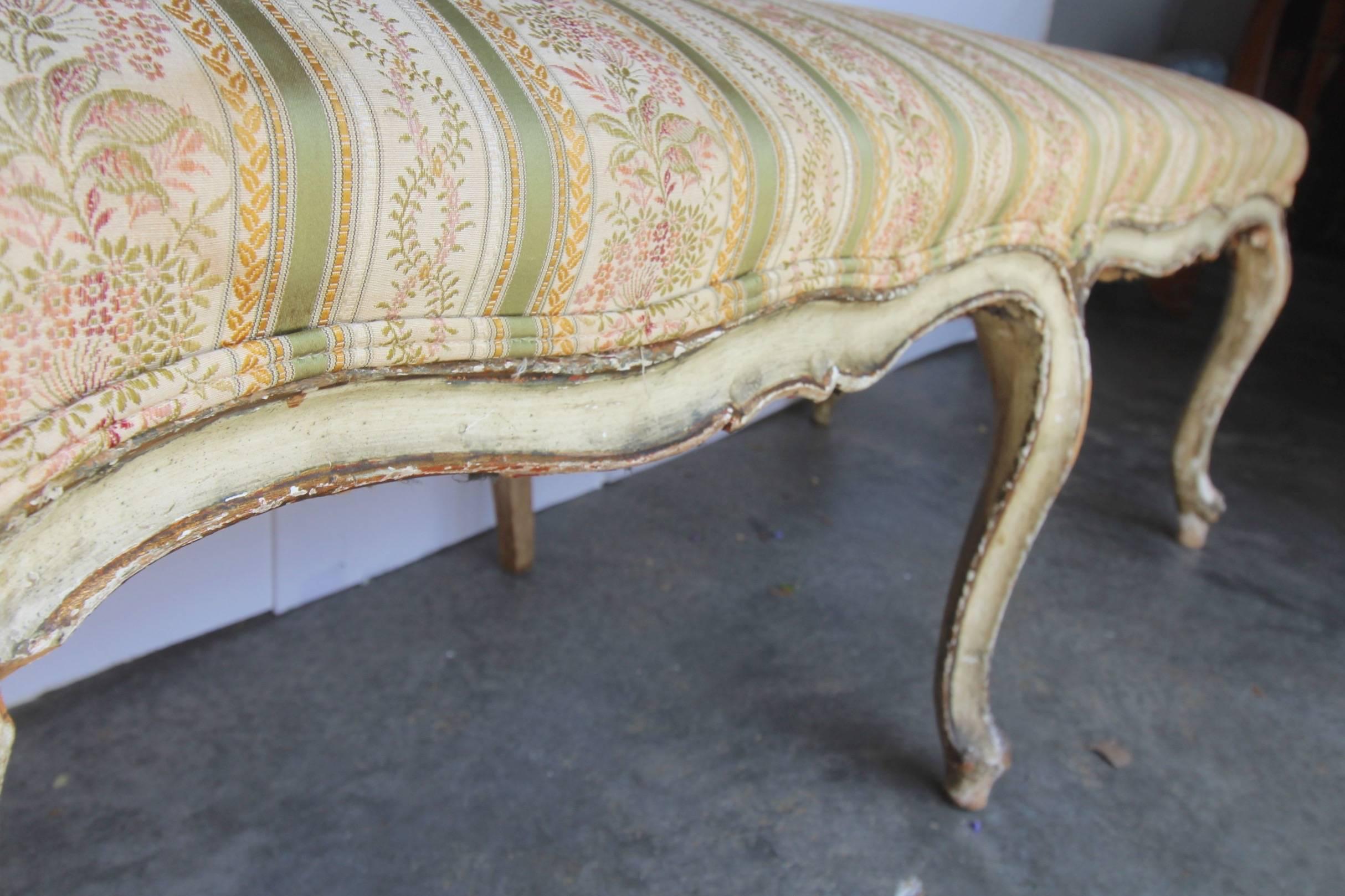 Very rare, elegant and sturdy large Louis XV period bench having eight legs in total with six being hand-carved cabriole with carved molding and two straight one -by consruction -in the center back (hardly visible).
French Gray/Greenish and white