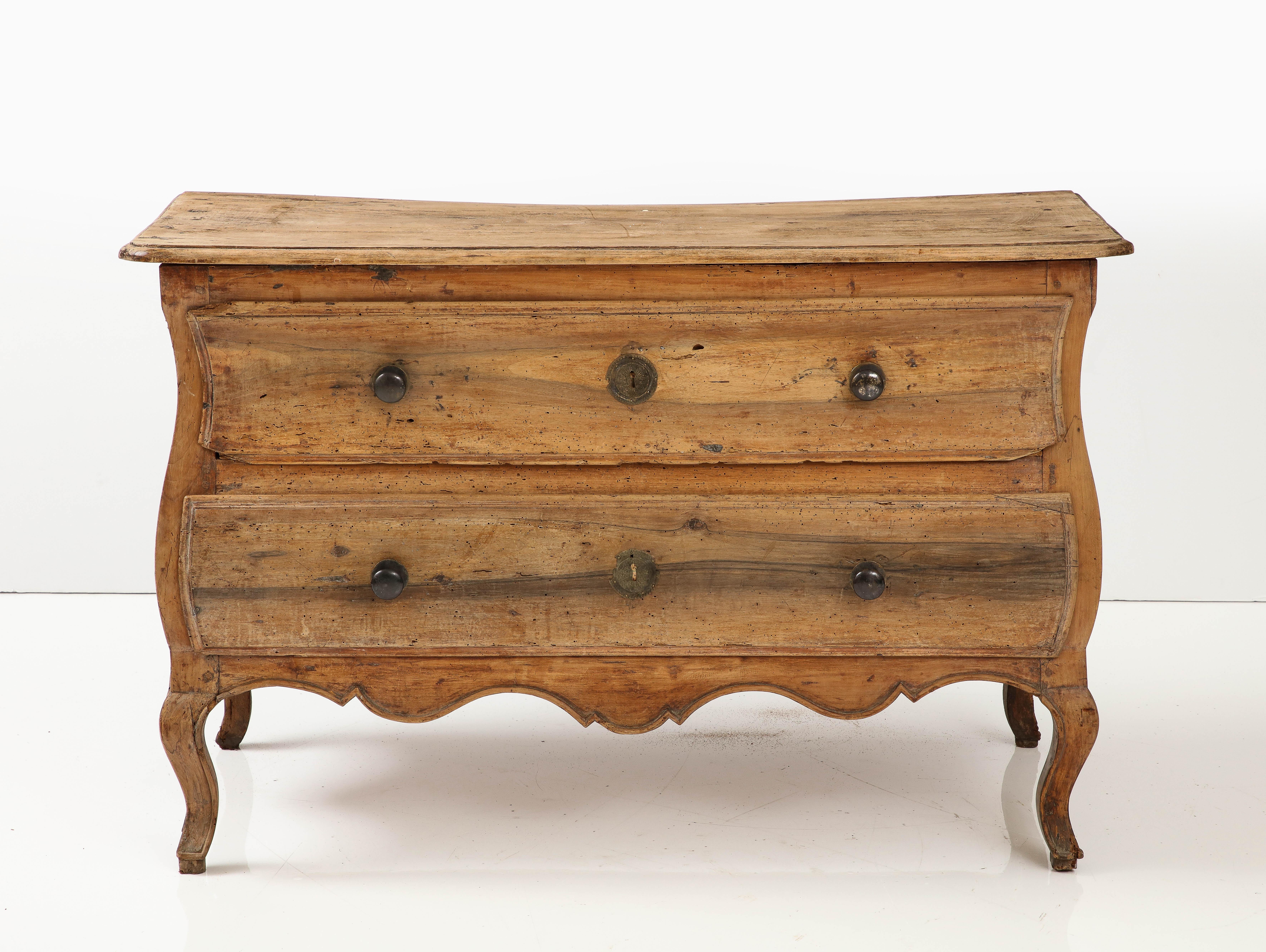 18th century French Walnut Commode, Castres, Pyrénées, c. 1760
Dry walnut, Original Pulls, later Escutcheons

H: 32 D: 24 W: 50 in.