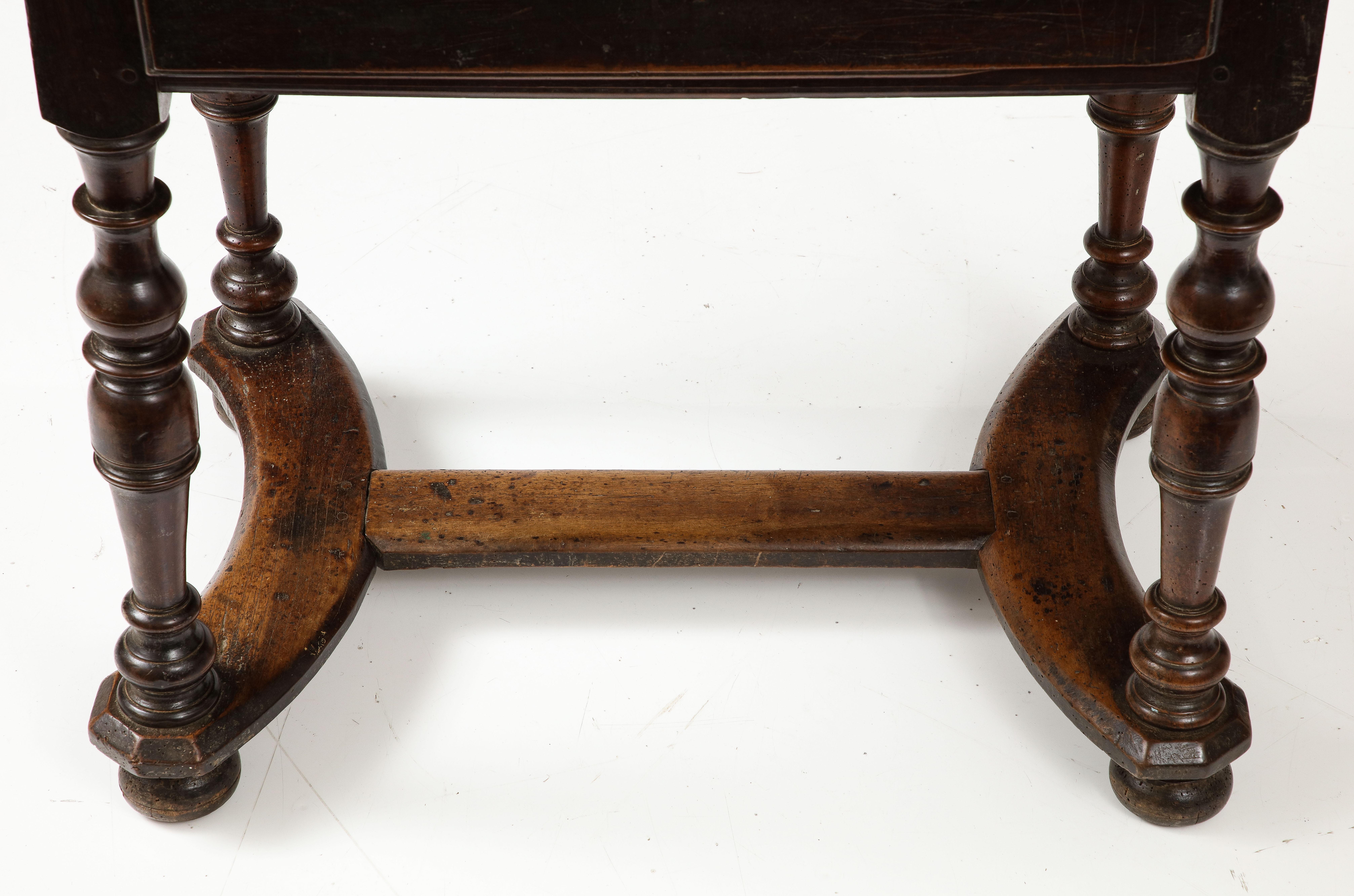 Baroque 18th C. French Walnut Table with Beautifully Executed Stretcher and Patina For Sale