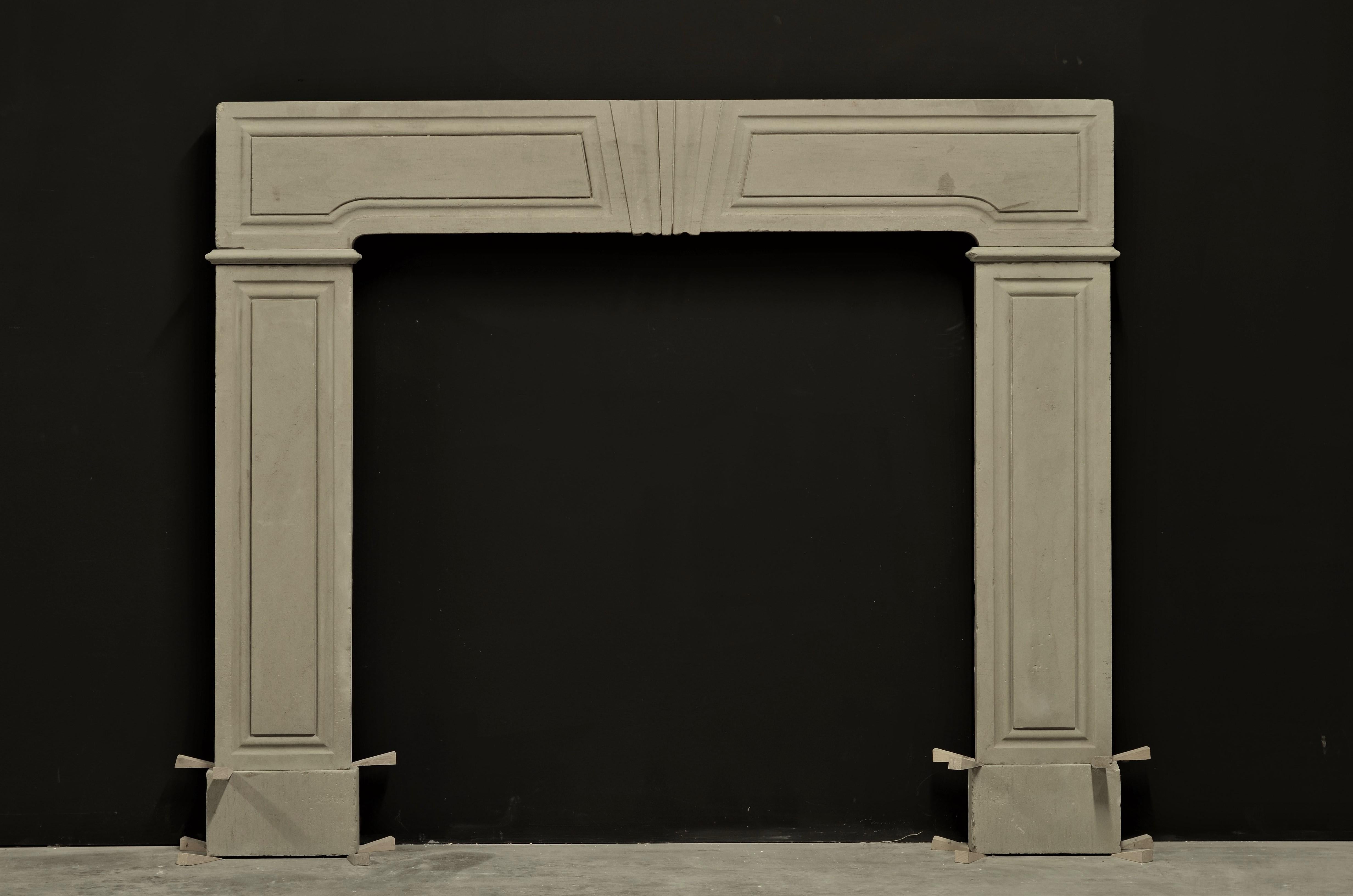 Beautiful and strong early 18th century George II limestone panelled frame chimneypiece. 
The frieze centred by a moulded keystone with graduated flutes, flanked by raised panels, supported by panelled jambs,

circa 1740. 
Unrestored and in