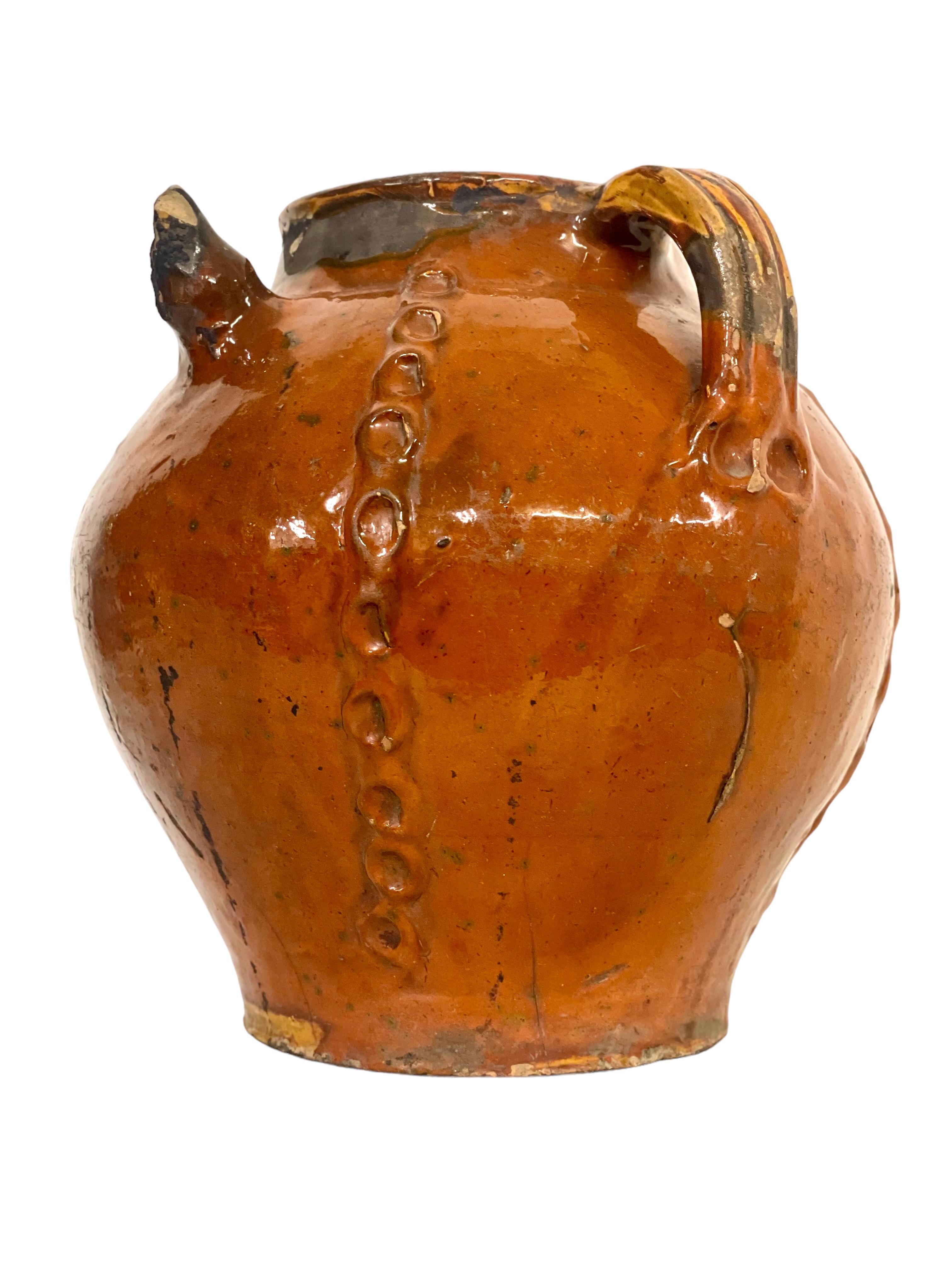 Rustic 18th Century French Glazed Walnut Oil Jug with Three Handles For Sale