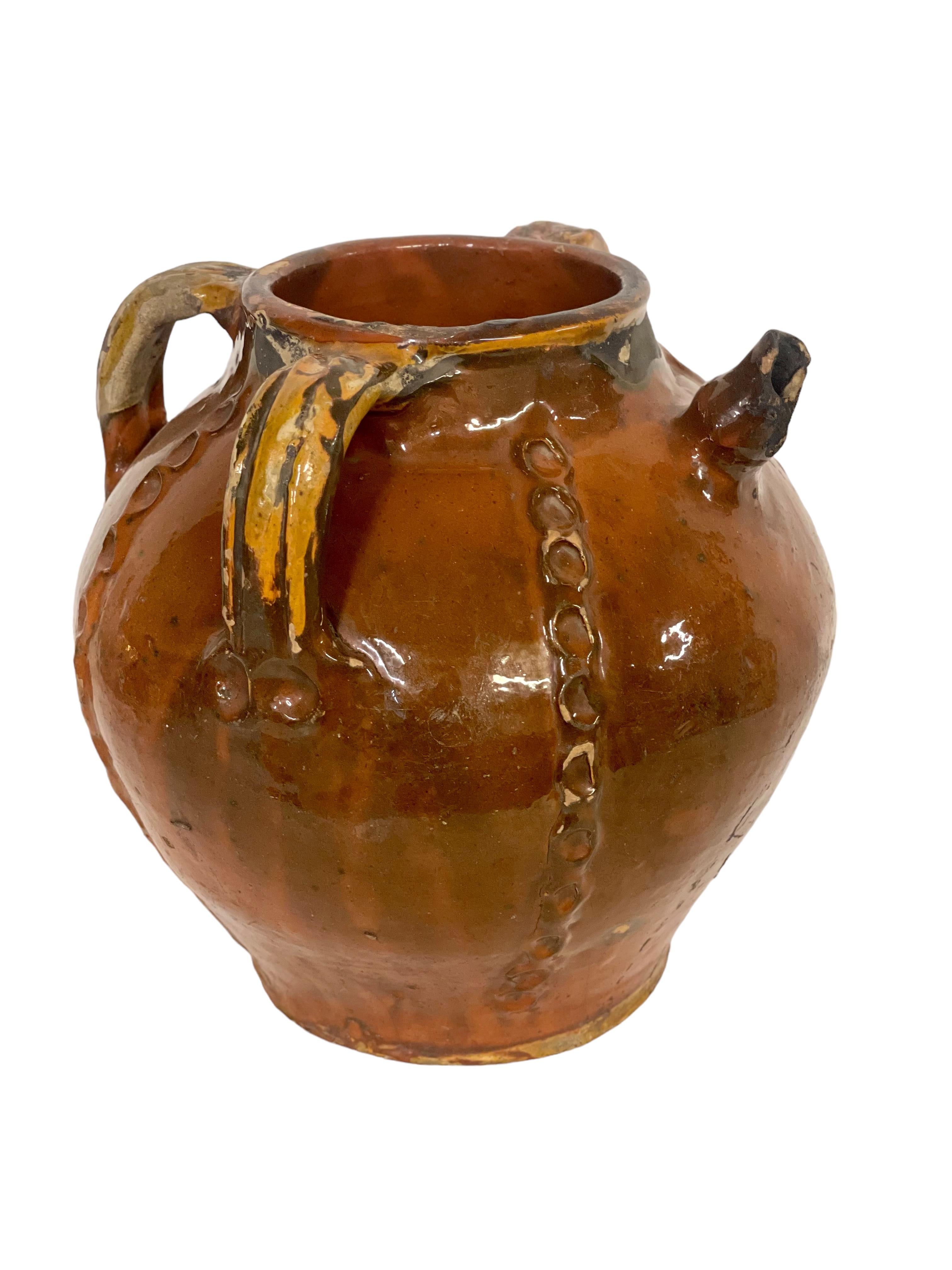 Earthenware 18th Century French Glazed Walnut Oil Jug with Three Handles For Sale