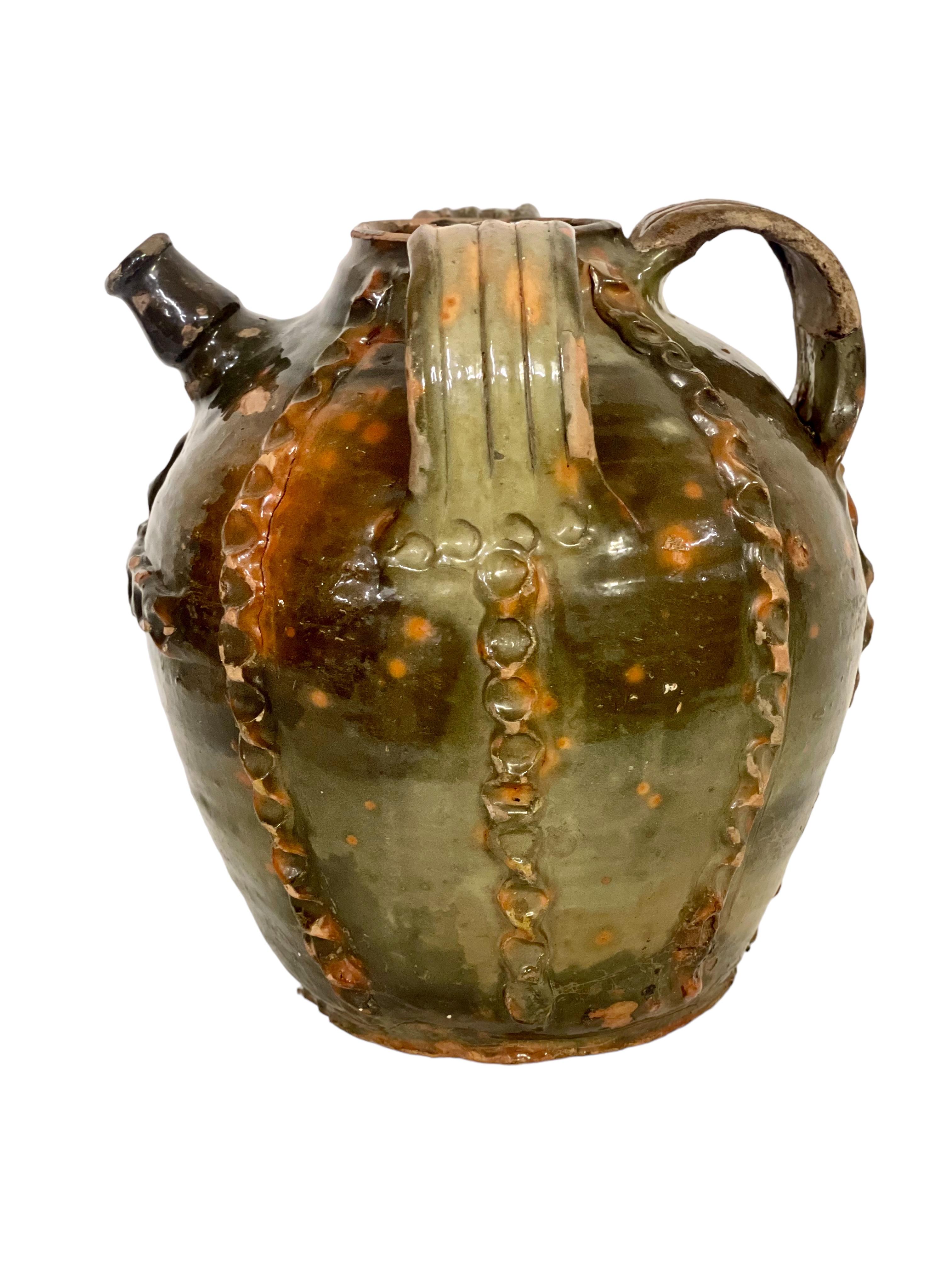 Earthenware 18th Century French Green Glazed Walnut Oil Jar  For Sale