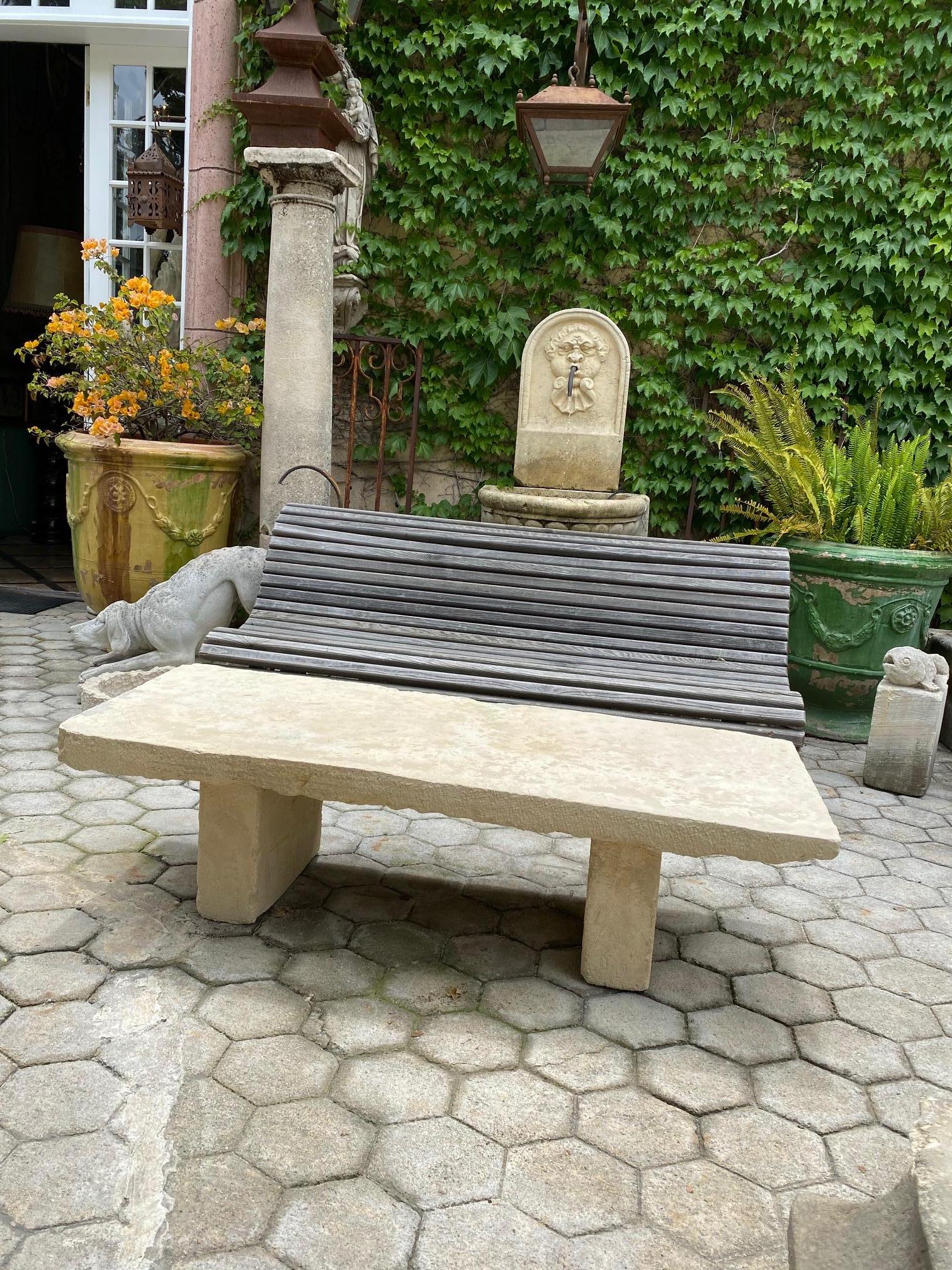 18th century hand carved stone antique garden low coffee Farm table element on simple carved stone bases pedestals. Or it could be used as a deep wide bench
It will be the perfect touch by an outdoor fireplace, This table has a lot of charm and