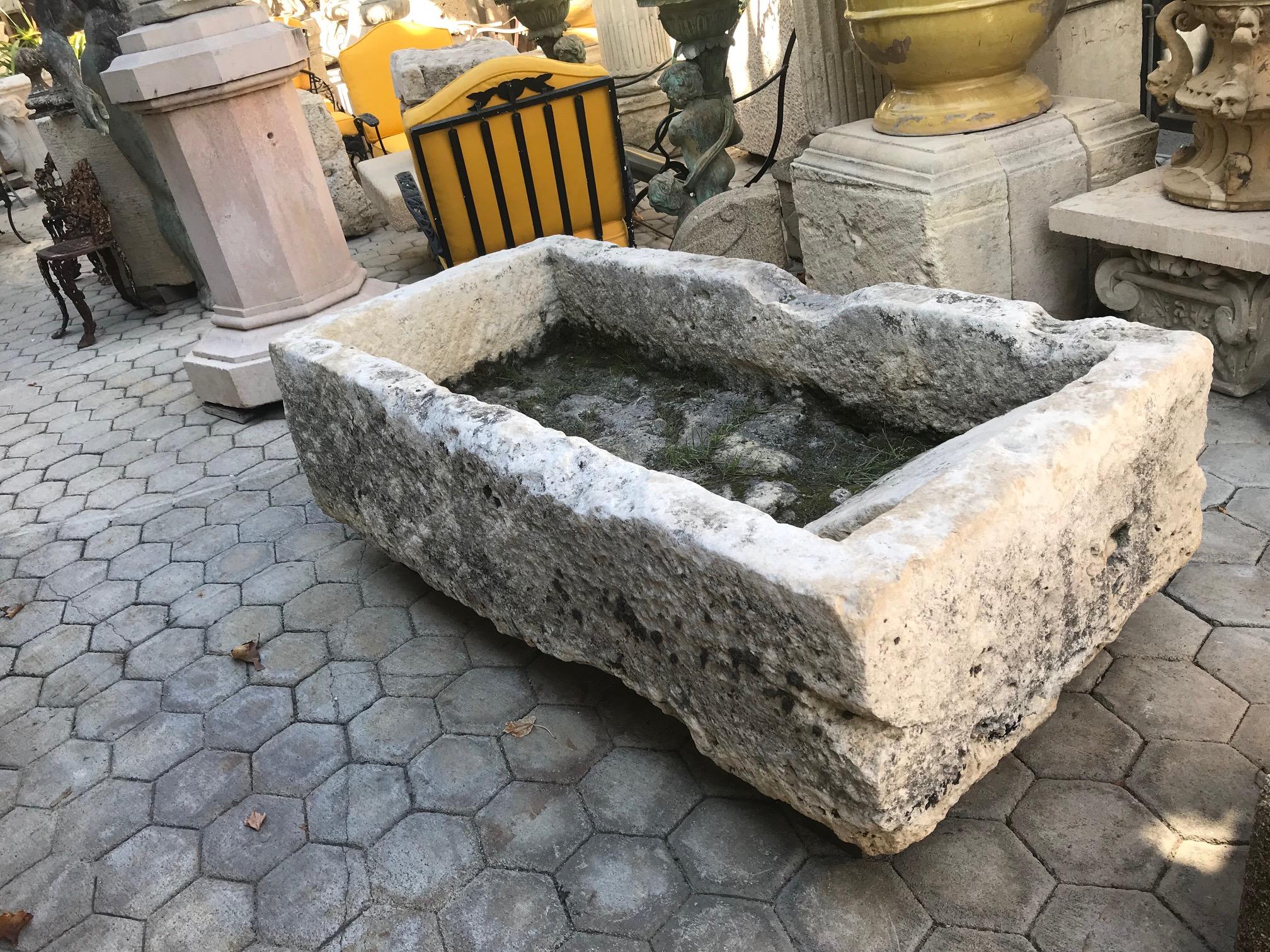 This exquisite 18th century water large fountain basin of hand carved stone. This trough could be installed with a simple bronze spout or a carved stone fountain head, we have many options of them, in order to create a charming garden water