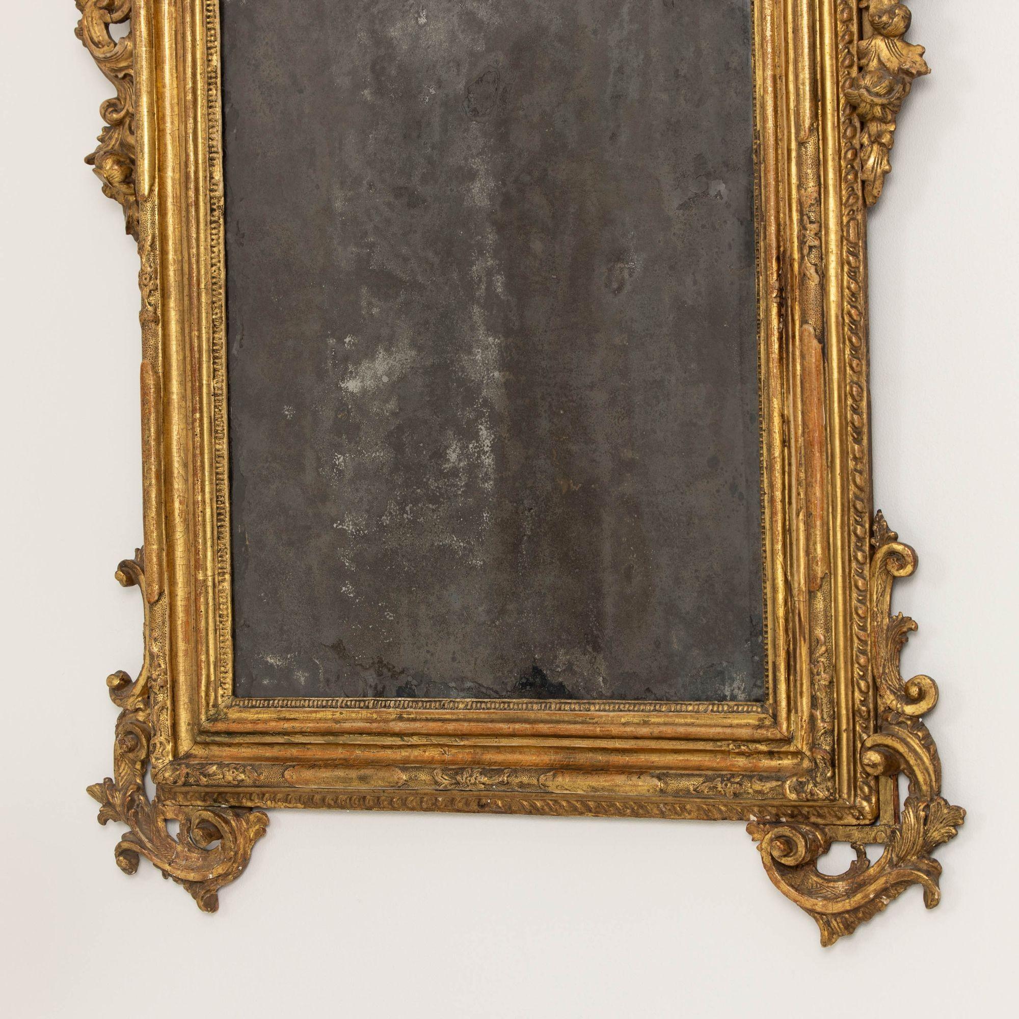 Sculpté à la main XVIIIe siècle Miroir baroque italien en bois doré d'origine avec plaques de miroir d'origine en vente