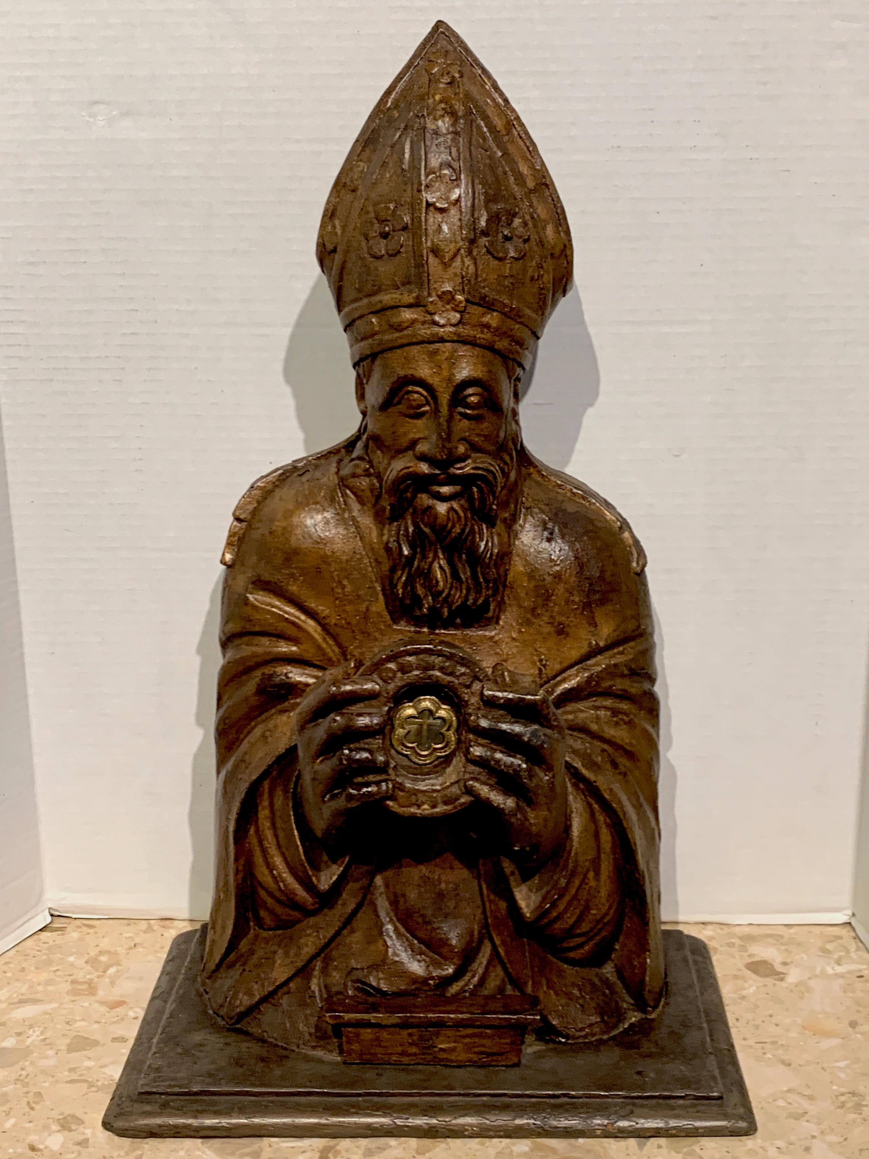 18th century Italian carved and polychromed Reliquary of Pope Pius V, Realistically carved and painted bust of Pope Pius V (?) holding a relic.
  