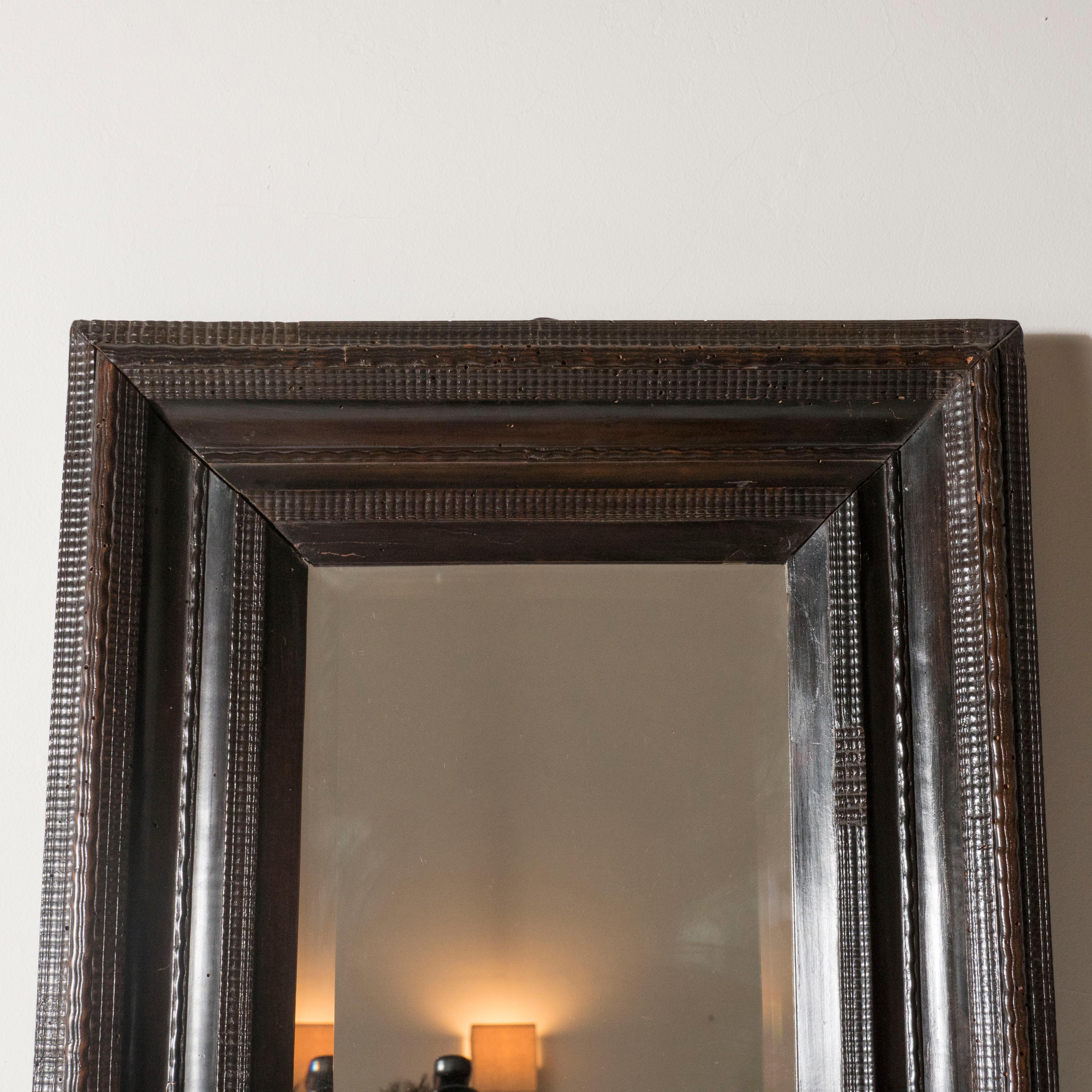 18th Century Italian Walnut Ebonized Mirror with Finely Carved Guilloche Detail In Good Condition In Brooklyn, NY