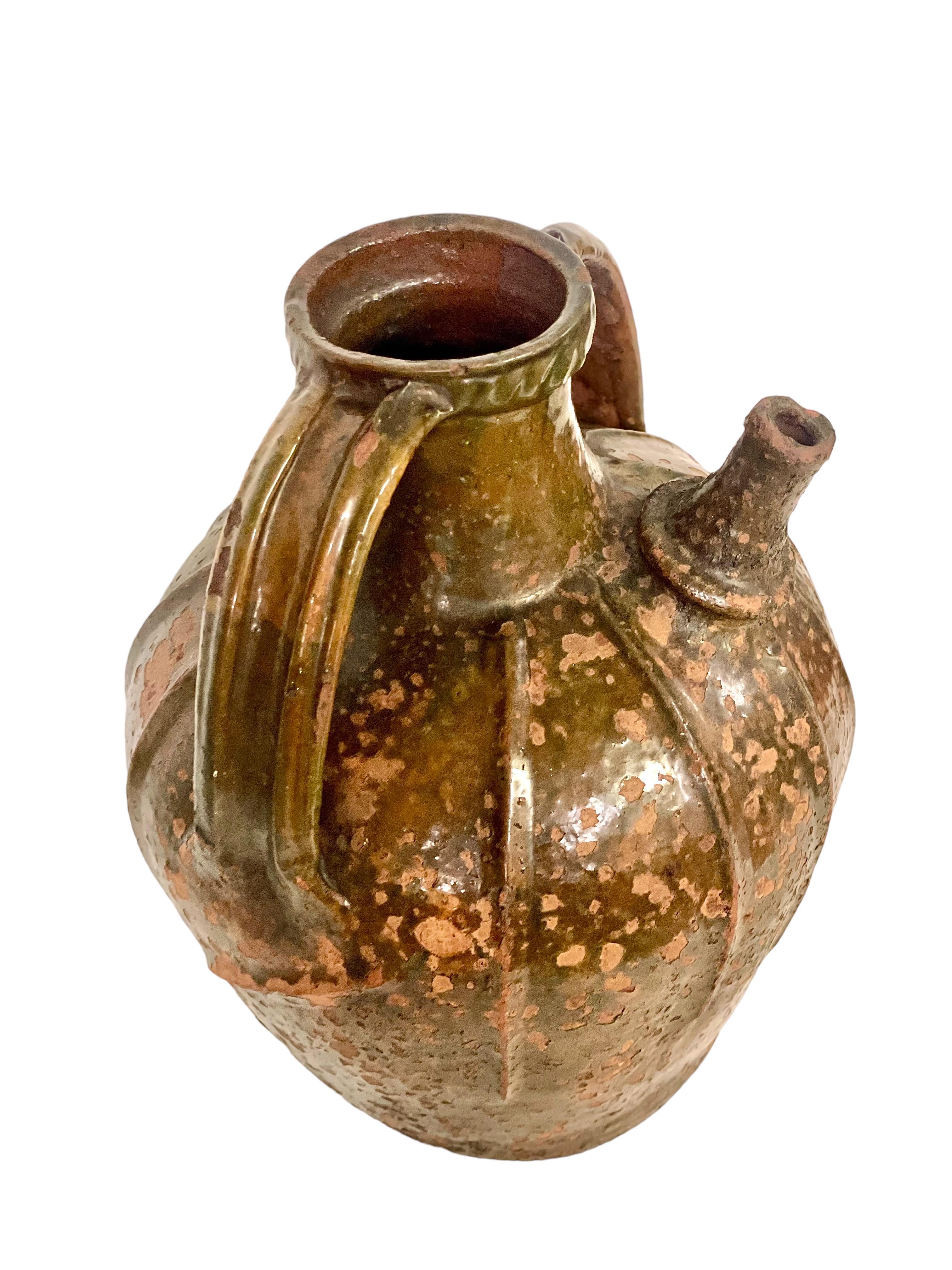 18th C. Large Glazed Terracotta Walnut Oil Jug with Two Side Handles For Sale 4