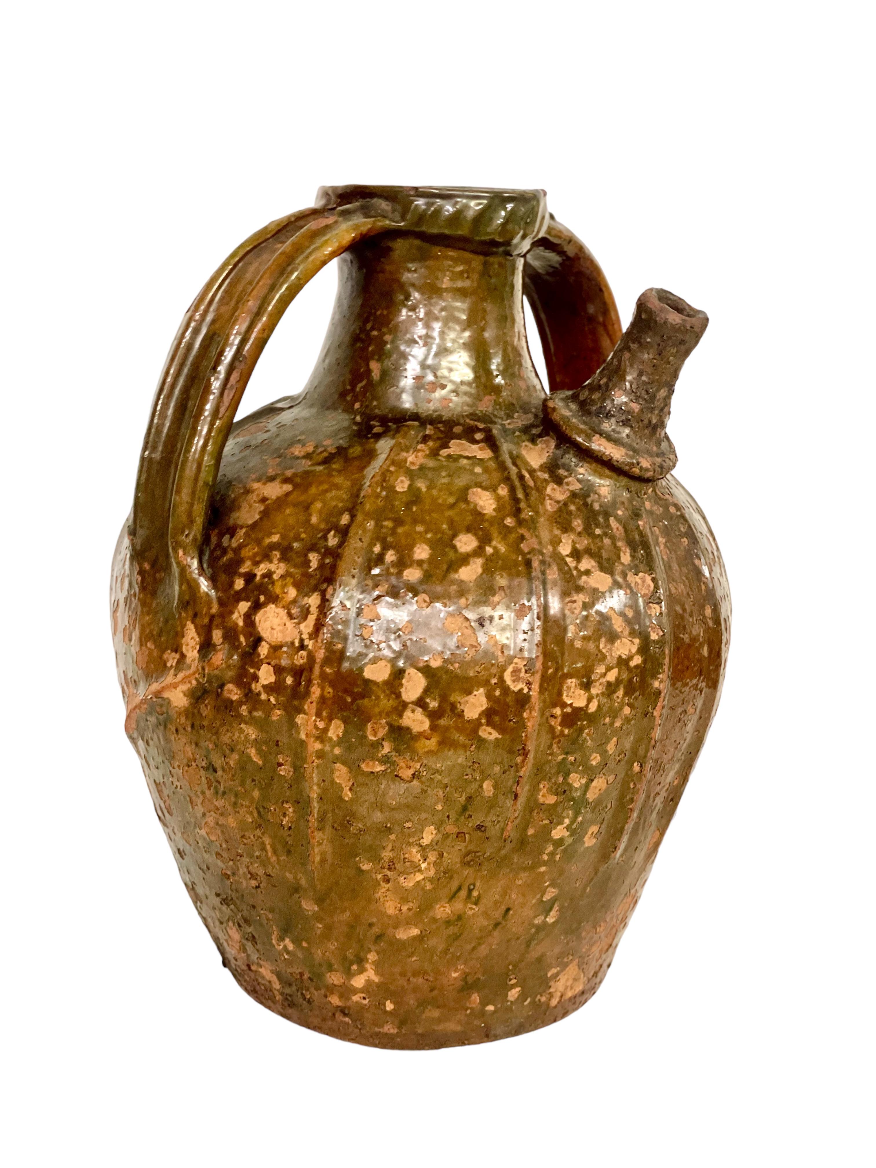 18th C. Large Glazed Terracotta Walnut Oil Jug with Two Side Handles For Sale 6