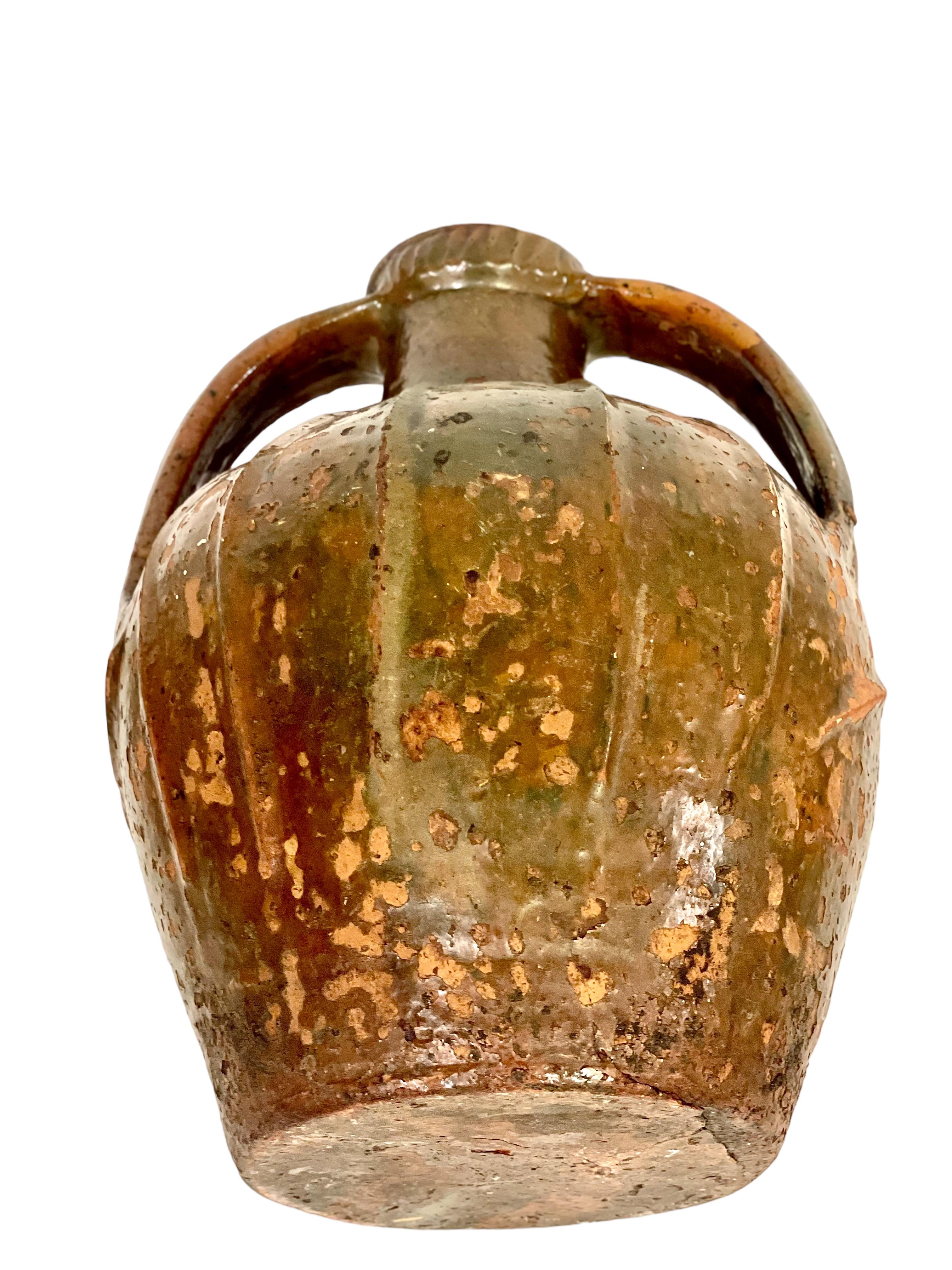 18th C. Large Glazed Terracotta Walnut Oil Jug with Two Side Handles For Sale 7