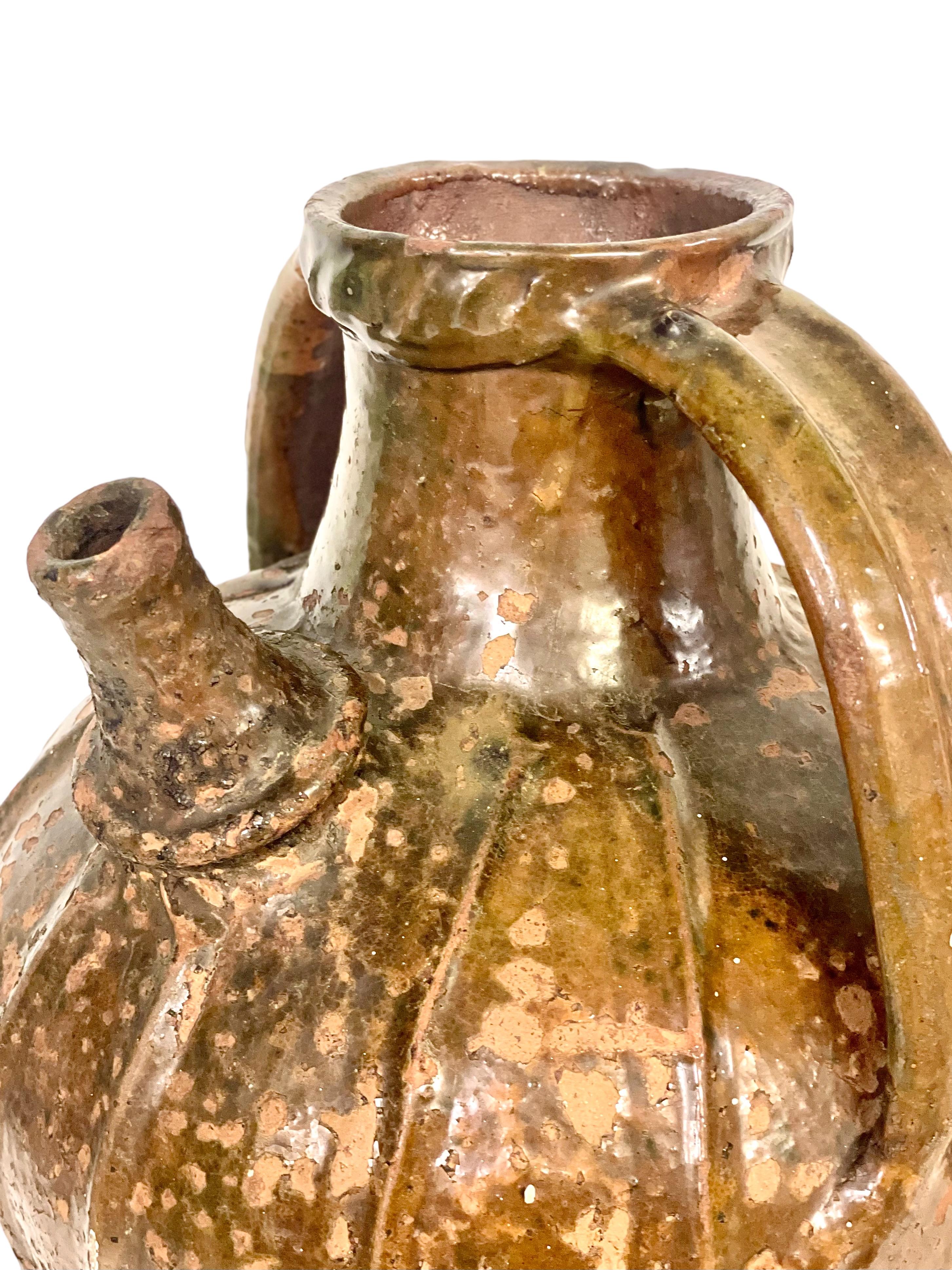 French 18th C. Large Glazed Terracotta Walnut Oil Jug with Two Side Handles For Sale