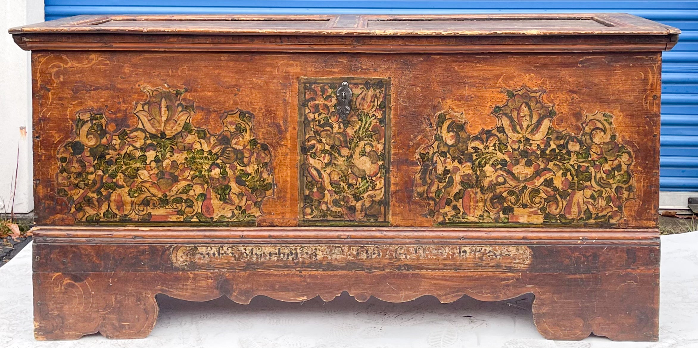 This is an exceptional piece! It is a large scale hand painted continental coffer or trunk. It could be Swedish in origin. Note hand forged hardware! It has early peg and dovetail construction as well. The painted details depict birds among a floral