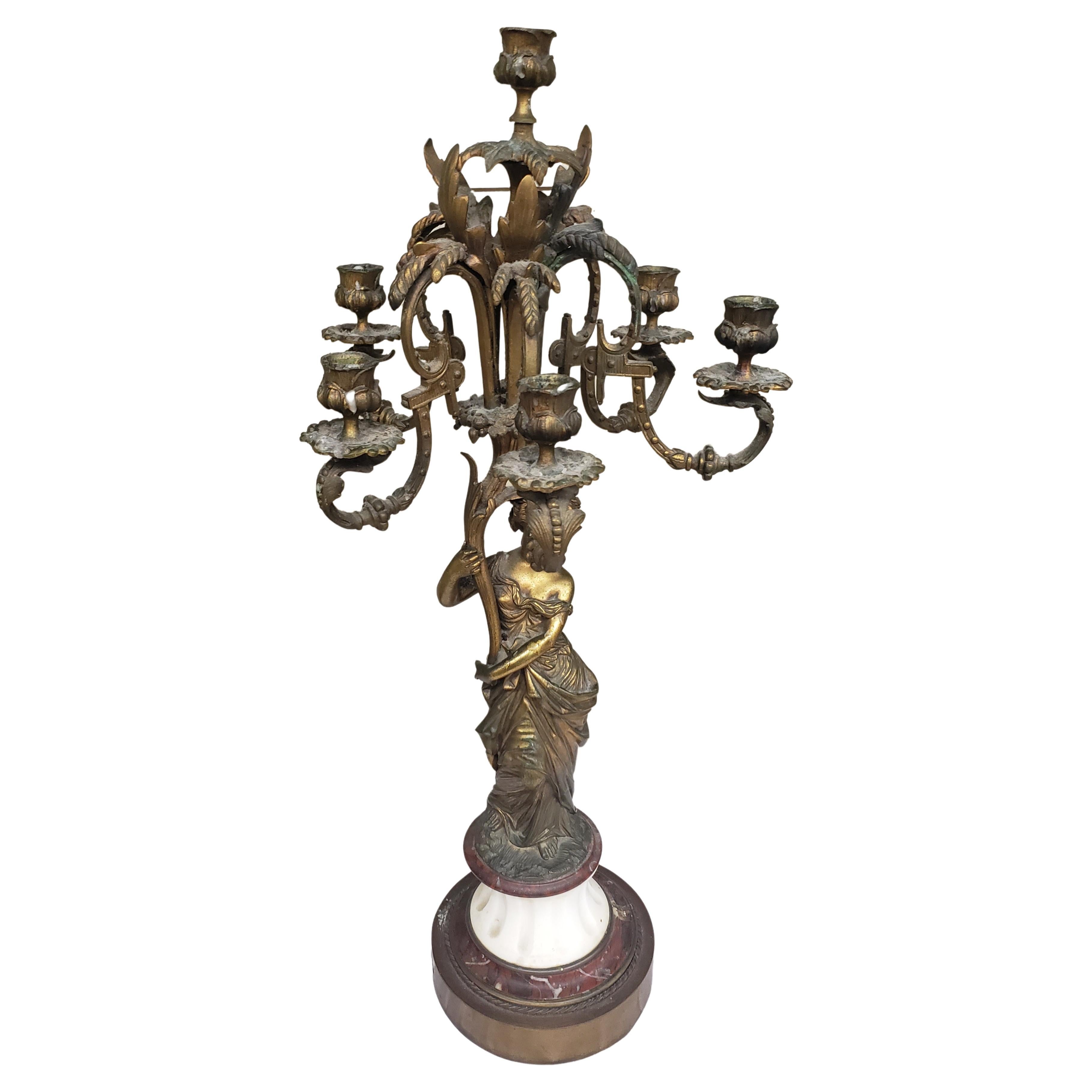 A 18th Century Louis-Philippe Bronze Ormolu With White and Mottled Rouge Marble six-light Figural Candelabrum in clean antique condition. It stands 27'5
