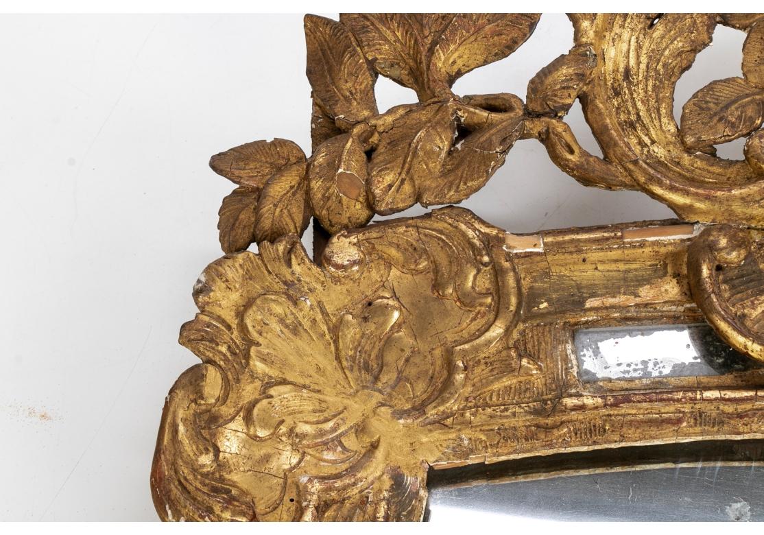 18th C. Louis XIV Style Segmented Carved And Gilt Mirror In Distressed Condition In Bridgeport, CT