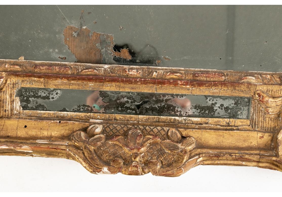 18th Century and Earlier 18th C. Louis XIV Style Segmented Carved And Gilt Mirror