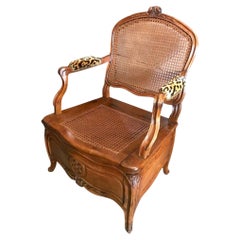 18th C. Louis XV Beach wood and Cain Arm Chair Chaise Percée Side chair. Antique