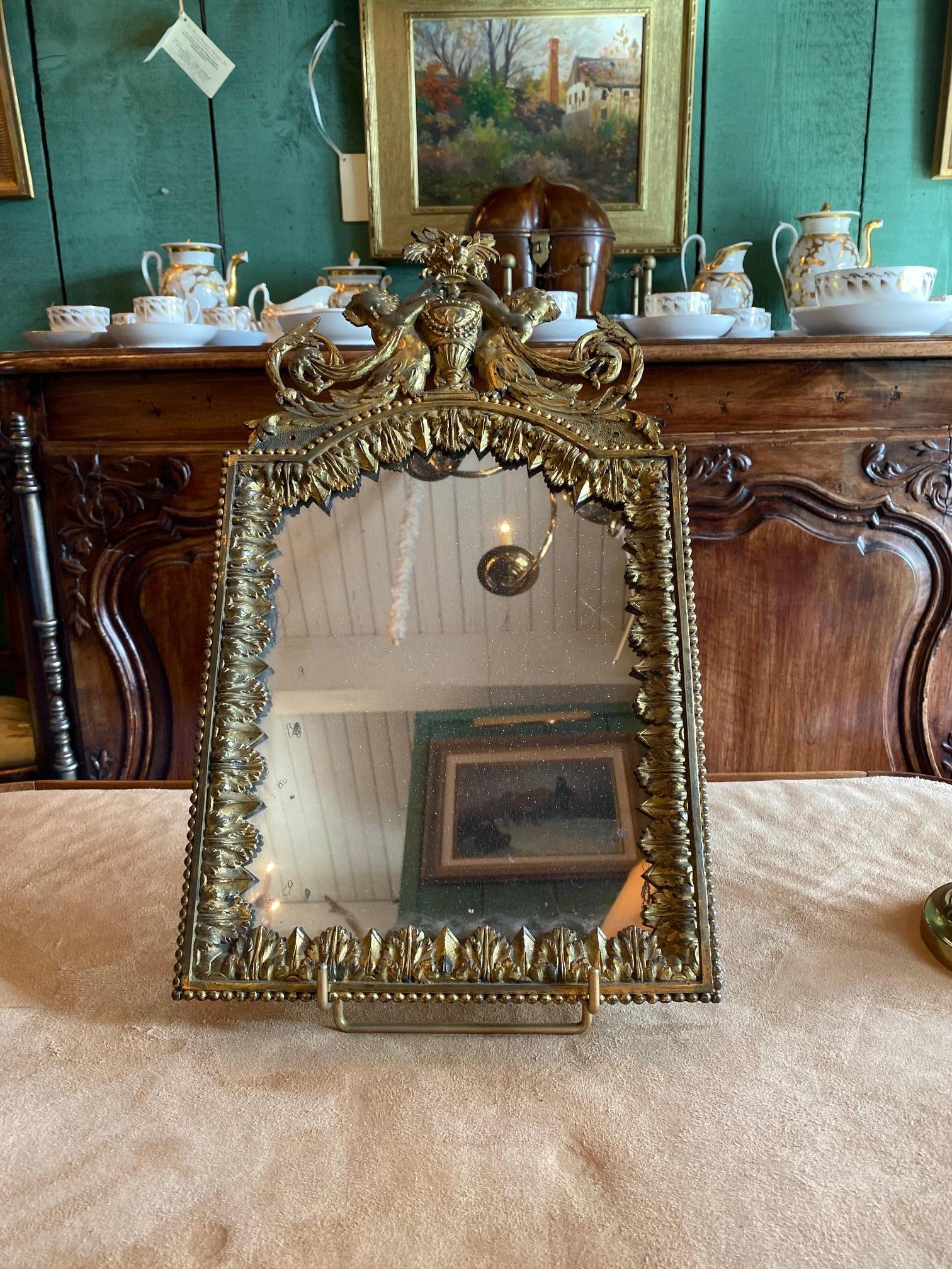 18th C. Antique Gilded Bronze Mirror Glass Desk Console Wall Mount Handcrafted 
A superb handcrafted and gilded bronze, late 17th-18th century period Louis XVI antique mirror with original decorative top side’s bottom and back France. It’s like a